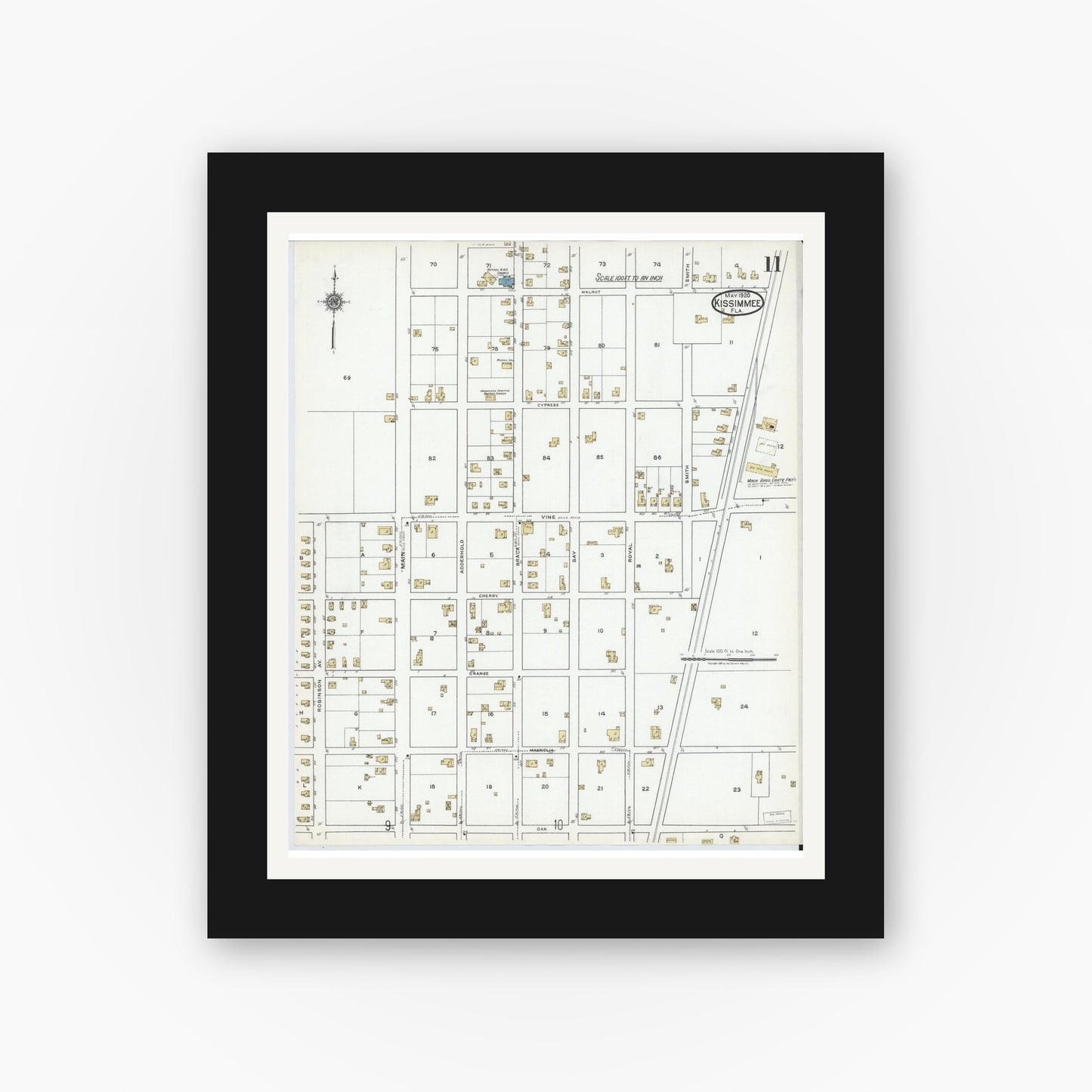 Old map wall art mockup — black gallery frame with white mat — Sanborn Fire Insurance Map from Kissimmee, Osceola County, Florida (1920), Sheet #0011