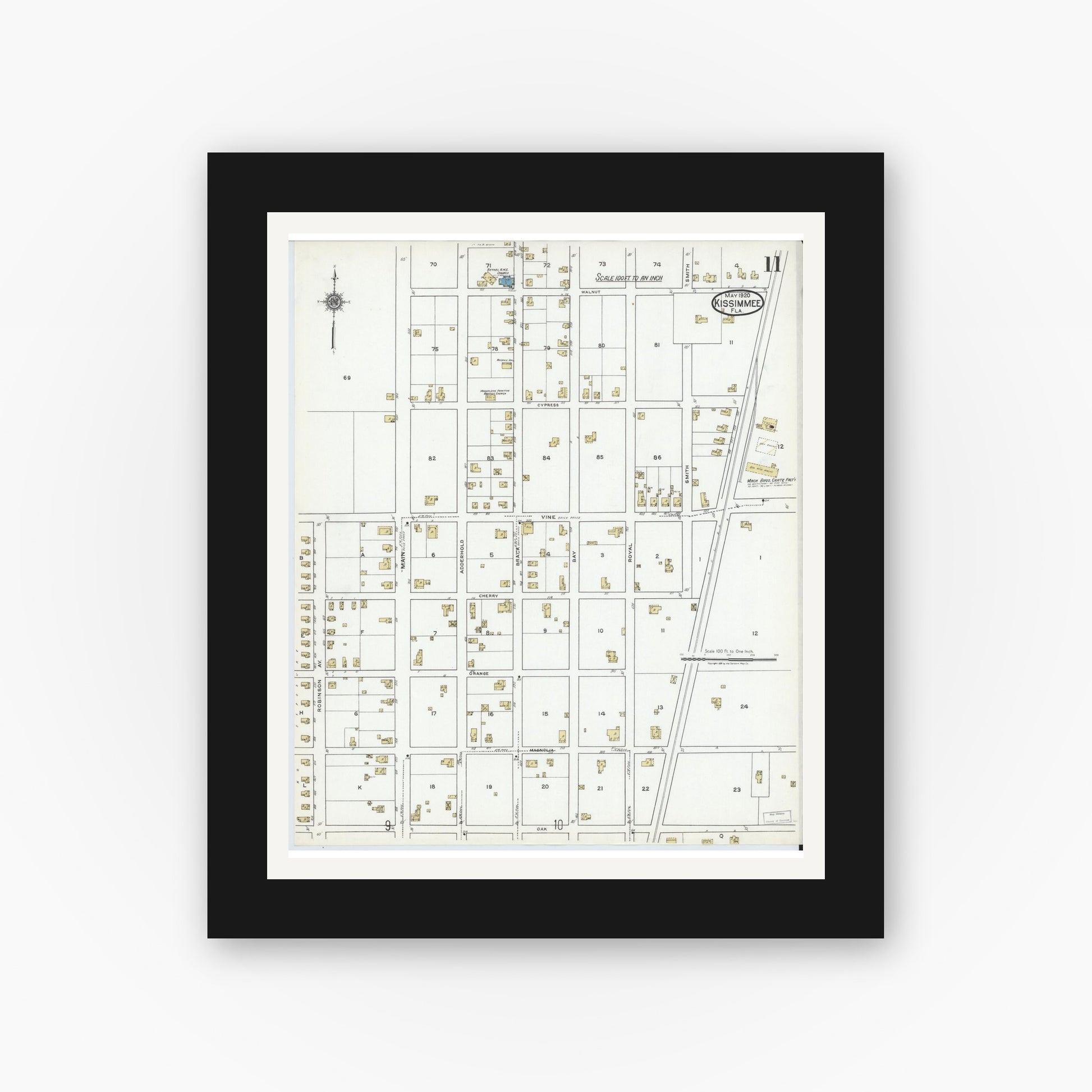 Old map wall art mockup — black gallery frame with white mat — Sanborn Fire Insurance Map from Kissimmee, Osceola County, Florida (1920), Sheet #0011