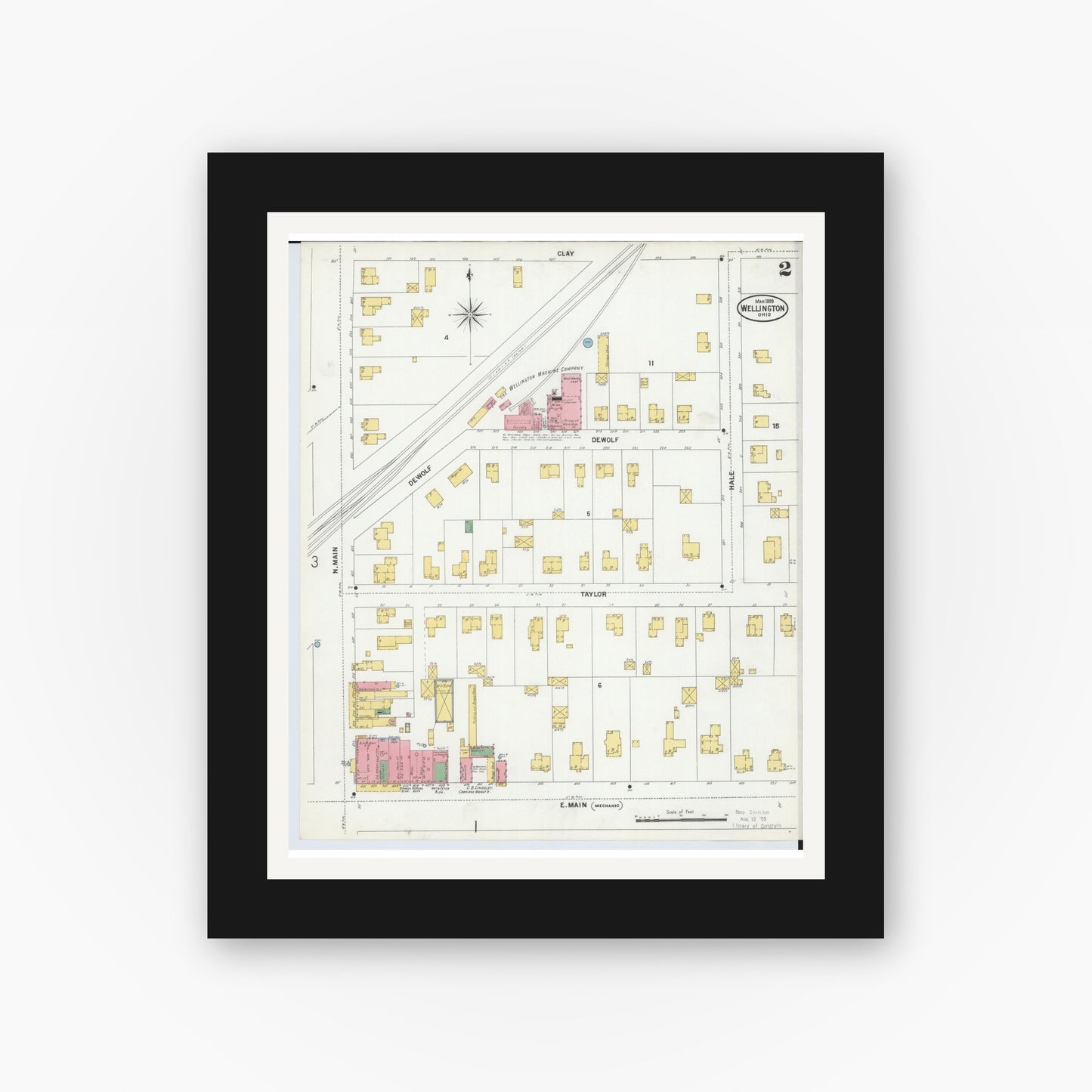 Old map wall art mockup — black gallery frame with white mat — Sanborn Fire Insurance Map from Wellington, Lorain County, Ohio (1899), Sheet #0002