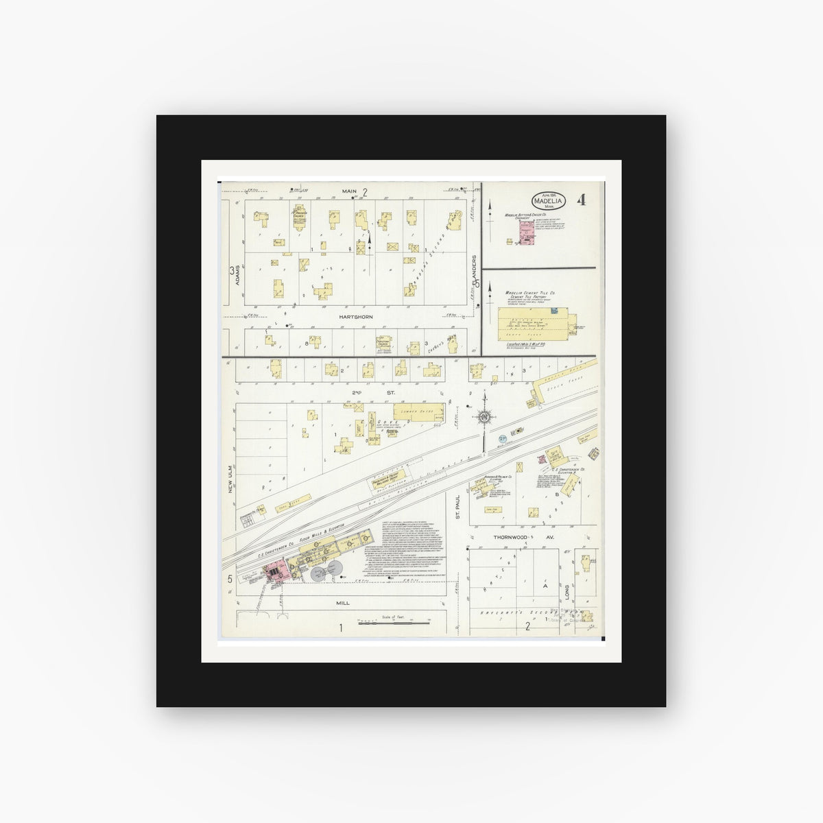 Old map wall art mockup — black gallery frame with white mat — Sanborn Fire Insurance Map from Madelia, Watonwan County, Minnesota (1914), Sheet #0004