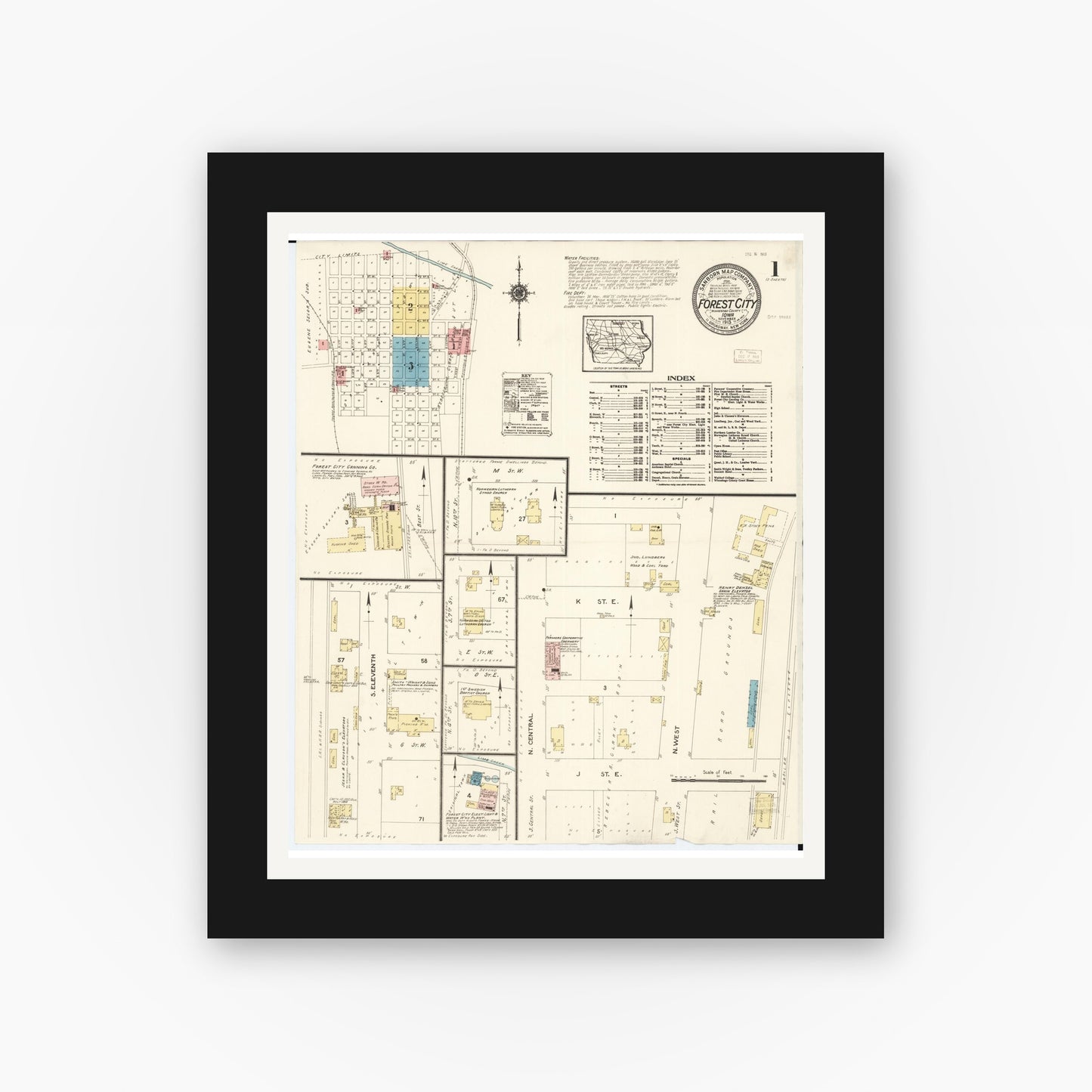 Old map wall art mockup — black gallery frame with white mat — Sanborn Fire Insurance Map from Forest City, Winnebago County, Iowa (1913), Sheet #0001