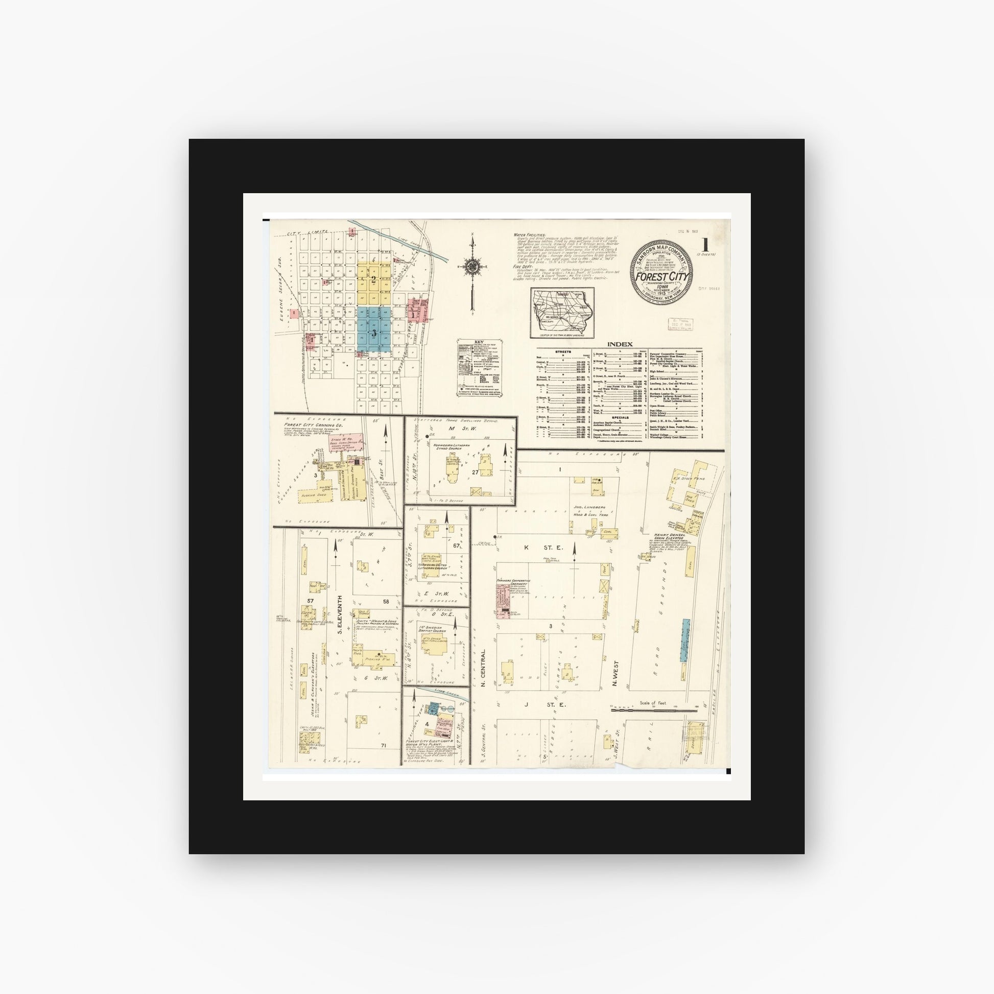 Old map wall art mockup — black gallery frame with white mat — Sanborn Fire Insurance Map from Forest City, Winnebago County, Iowa (1913), Sheet #0001