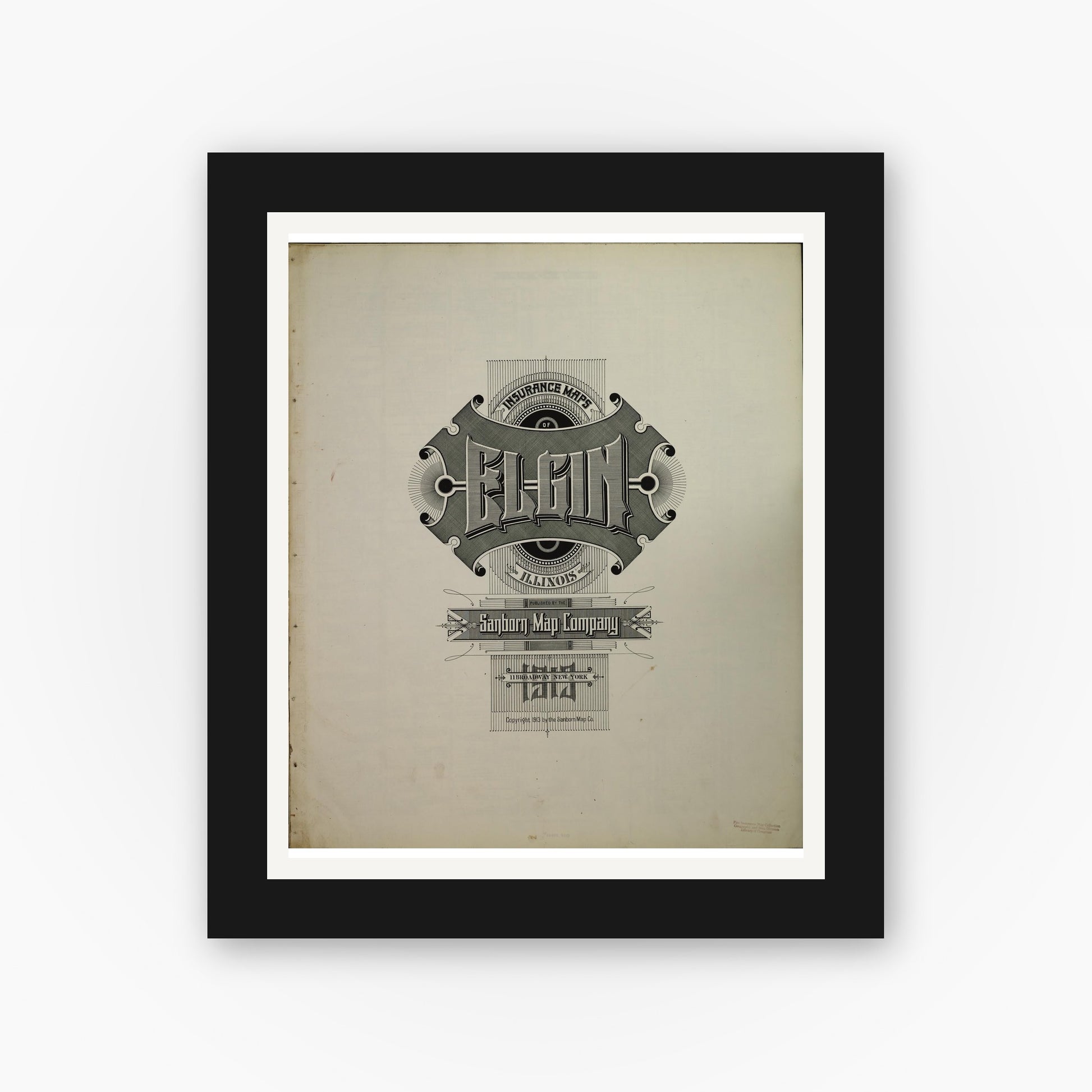 Old map wall art mockup — black gallery frame with white mat — Sanborn Fire Insurance Map from Elgin, Kane County, Illinois (1913), Sheet #0001