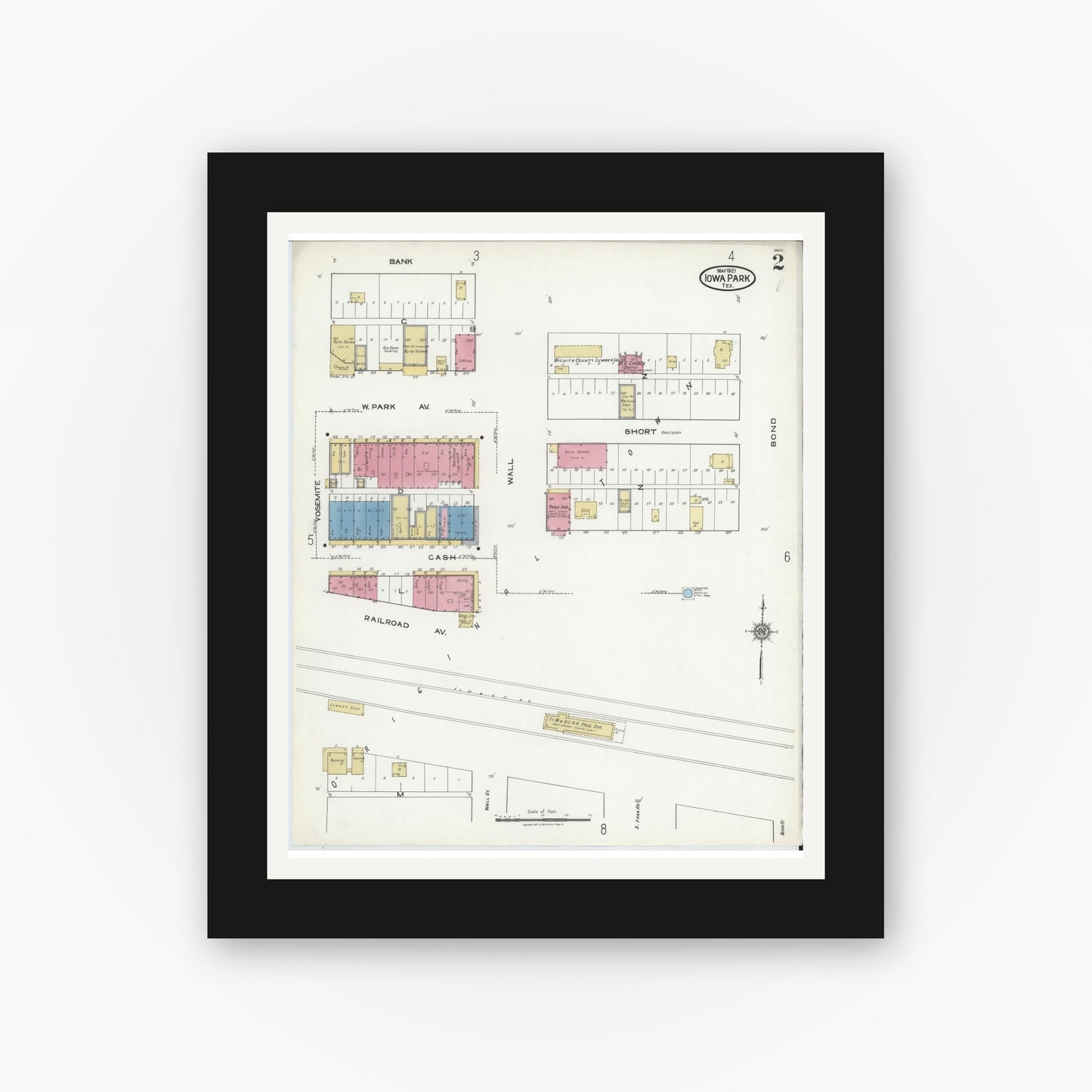 Old map wall art mockup — black gallery frame with white mat — Sanborn Fire Insurance Map from Iowa Park, Wichita County, Texas (1921), Sheet #0002