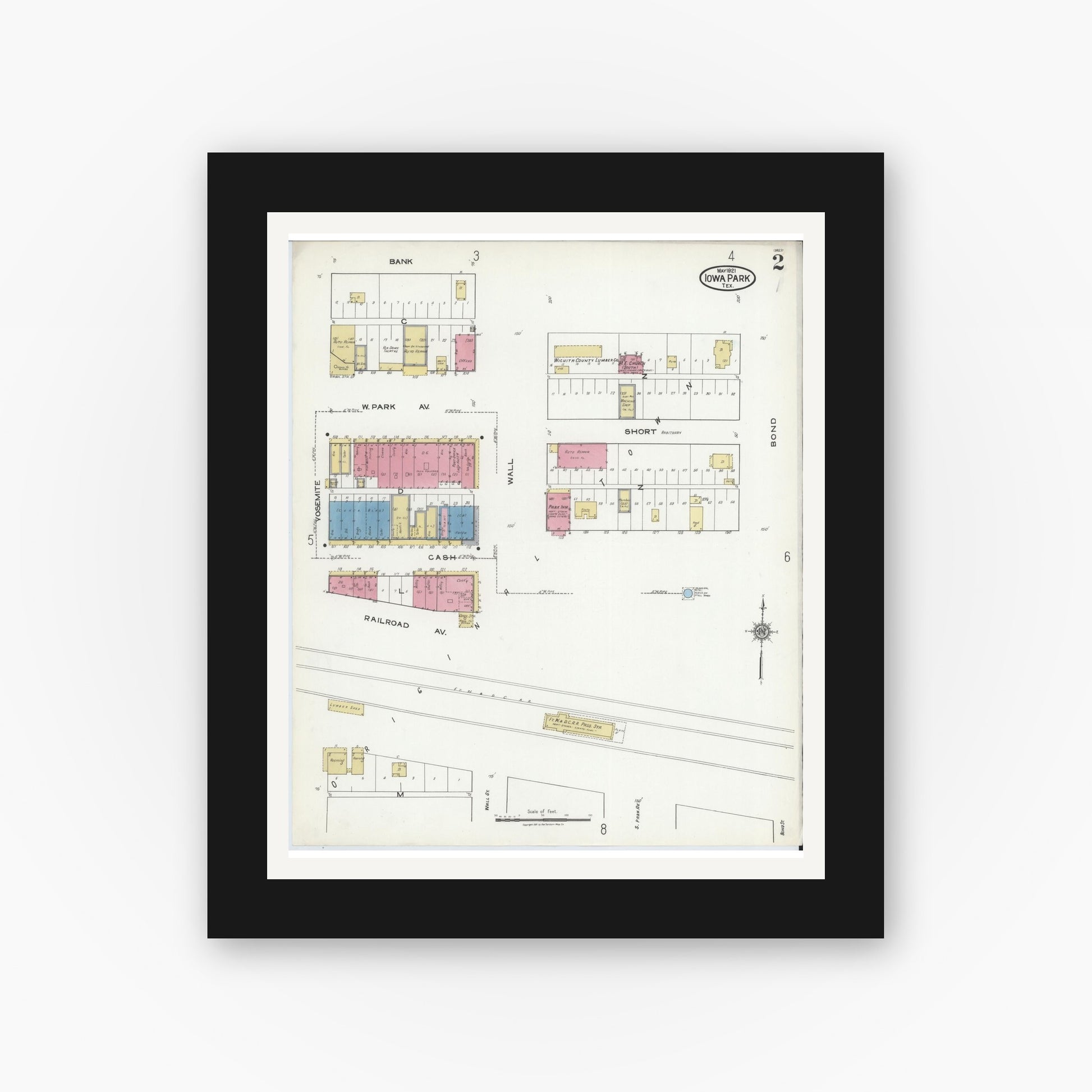 Old map wall art mockup — black gallery frame with white mat — Sanborn Fire Insurance Map from Iowa Park, Wichita County, Texas (1921), Sheet #0002