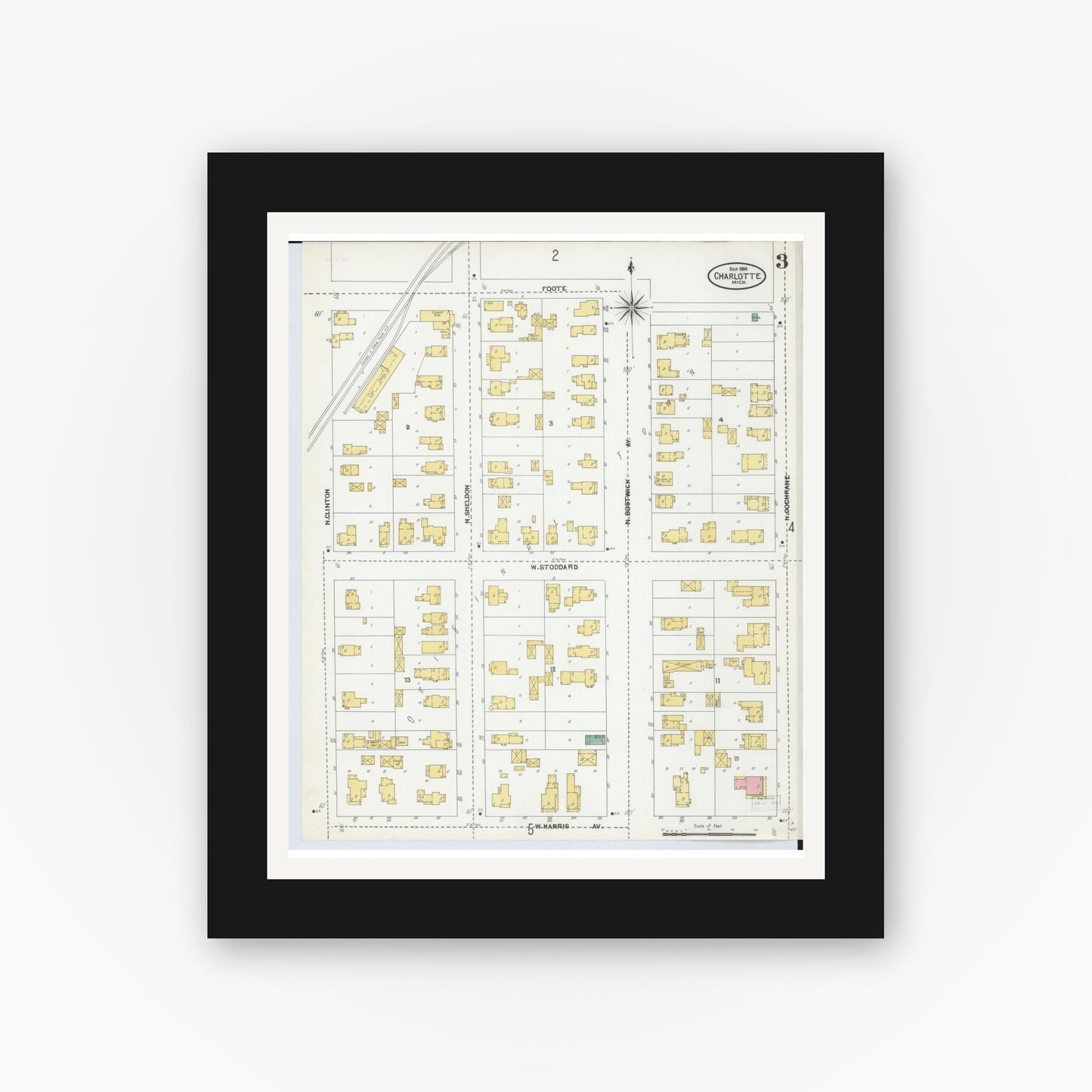Old map wall art mockup — black gallery frame with white mat — Sanborn Fire Insurance Map from Charlotte, Eaton County, Michigan (1904), Sheet #0003