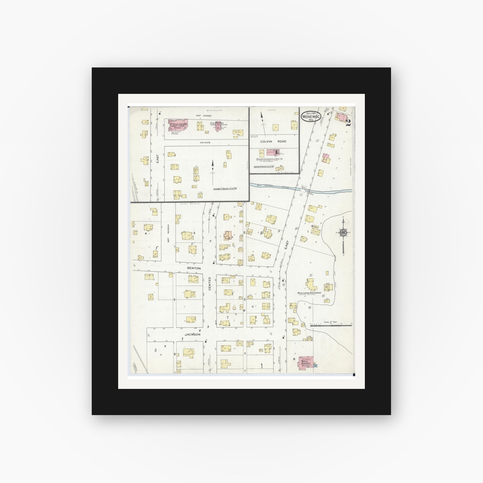 Old map wall art mockup — black gallery frame with white mat — Sanborn Fire Insurance Map from Wonewoc, Juneau County, Wisconsin (1914), Sheet #0002