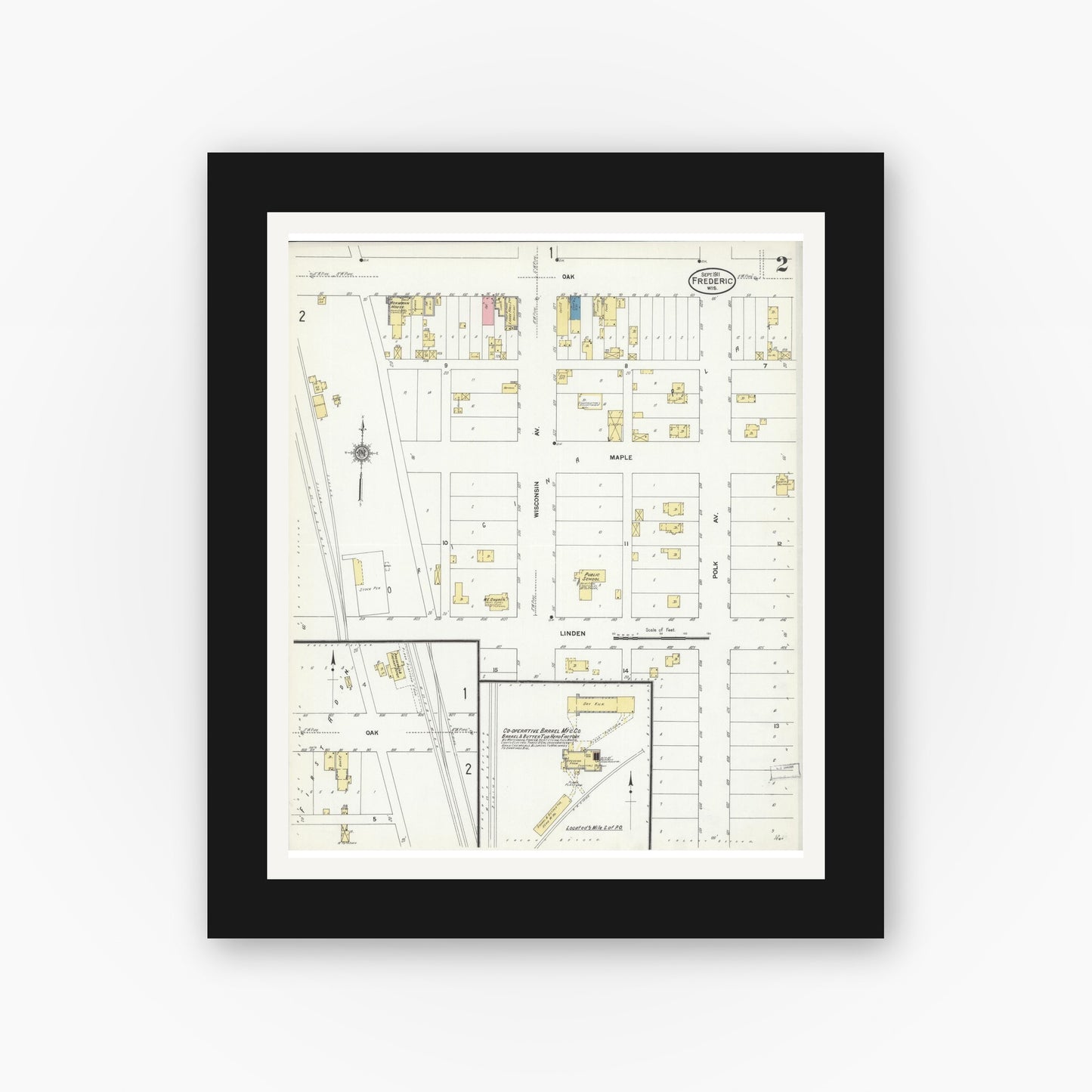 Old map wall art mockup — black gallery frame with white mat — Sanborn Fire Insurance Map from Frederic, Polk County, Wisconsin (1911), Sheet #0002