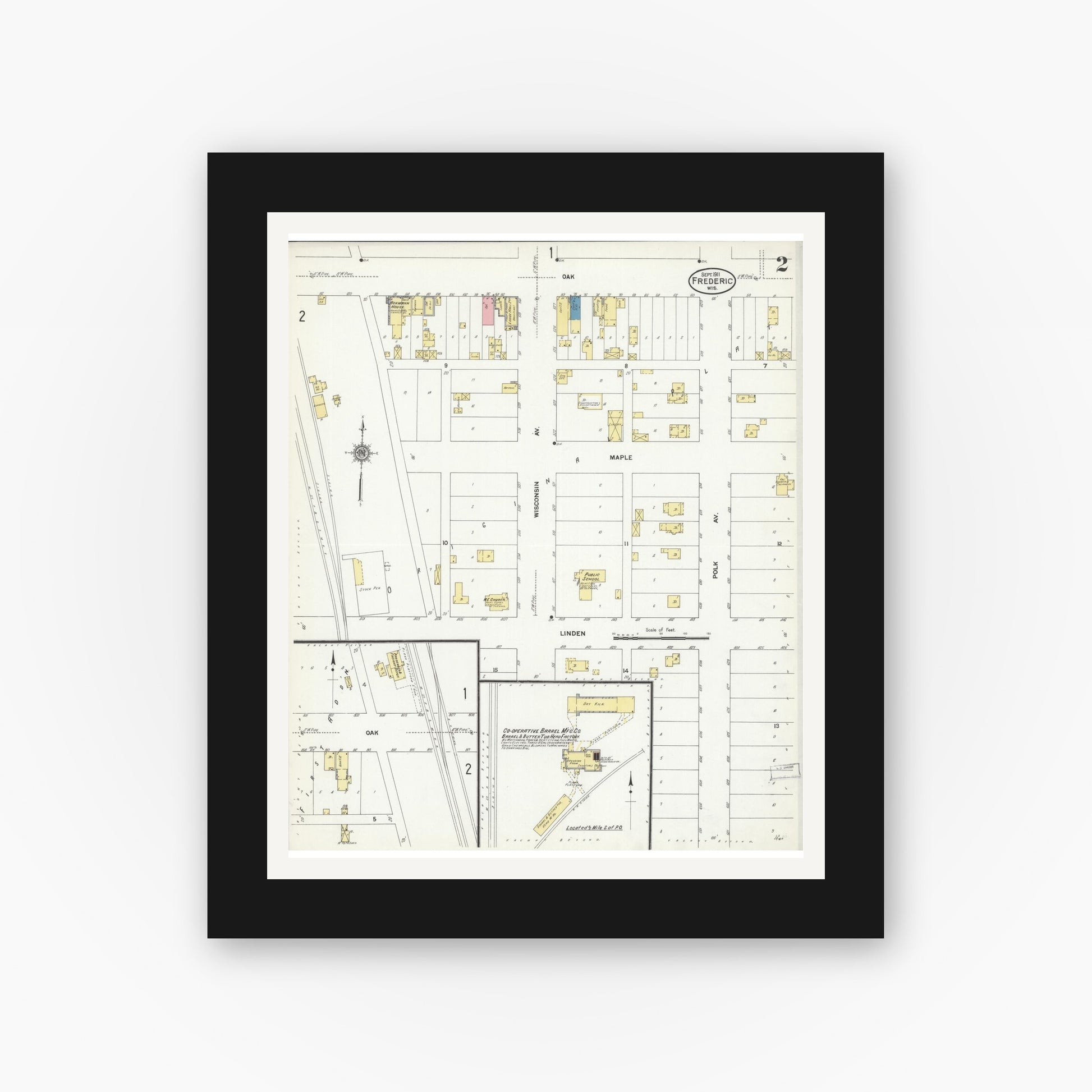Old map wall art mockup — black gallery frame with white mat — Sanborn Fire Insurance Map from Frederic, Polk County, Wisconsin (1911), Sheet #0002