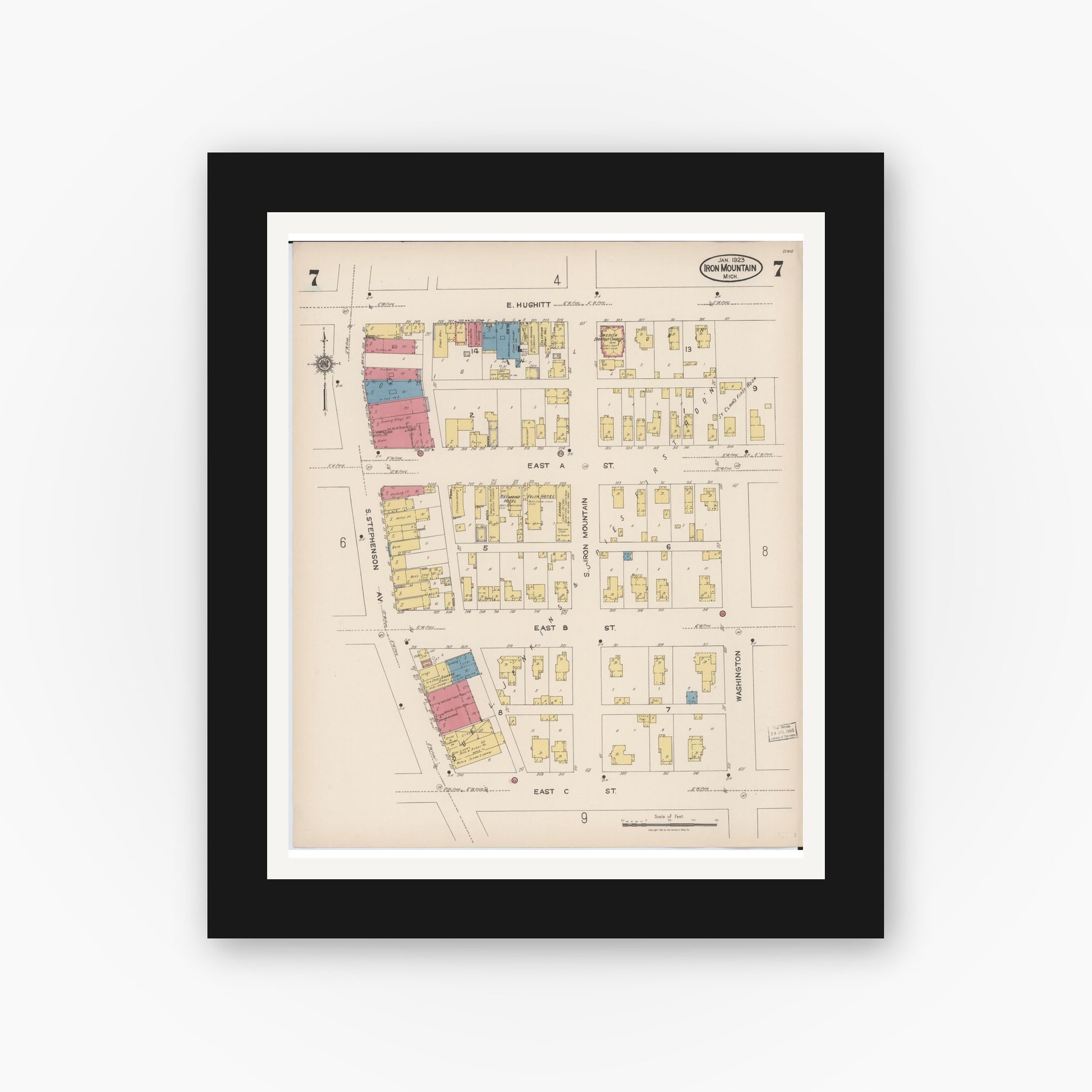 Old map wall art mockup — black gallery frame with white mat — Sanborn Fire Insurance Map from Iron Mountain, Dickinson County, Michigan (1923), Sheet #0007