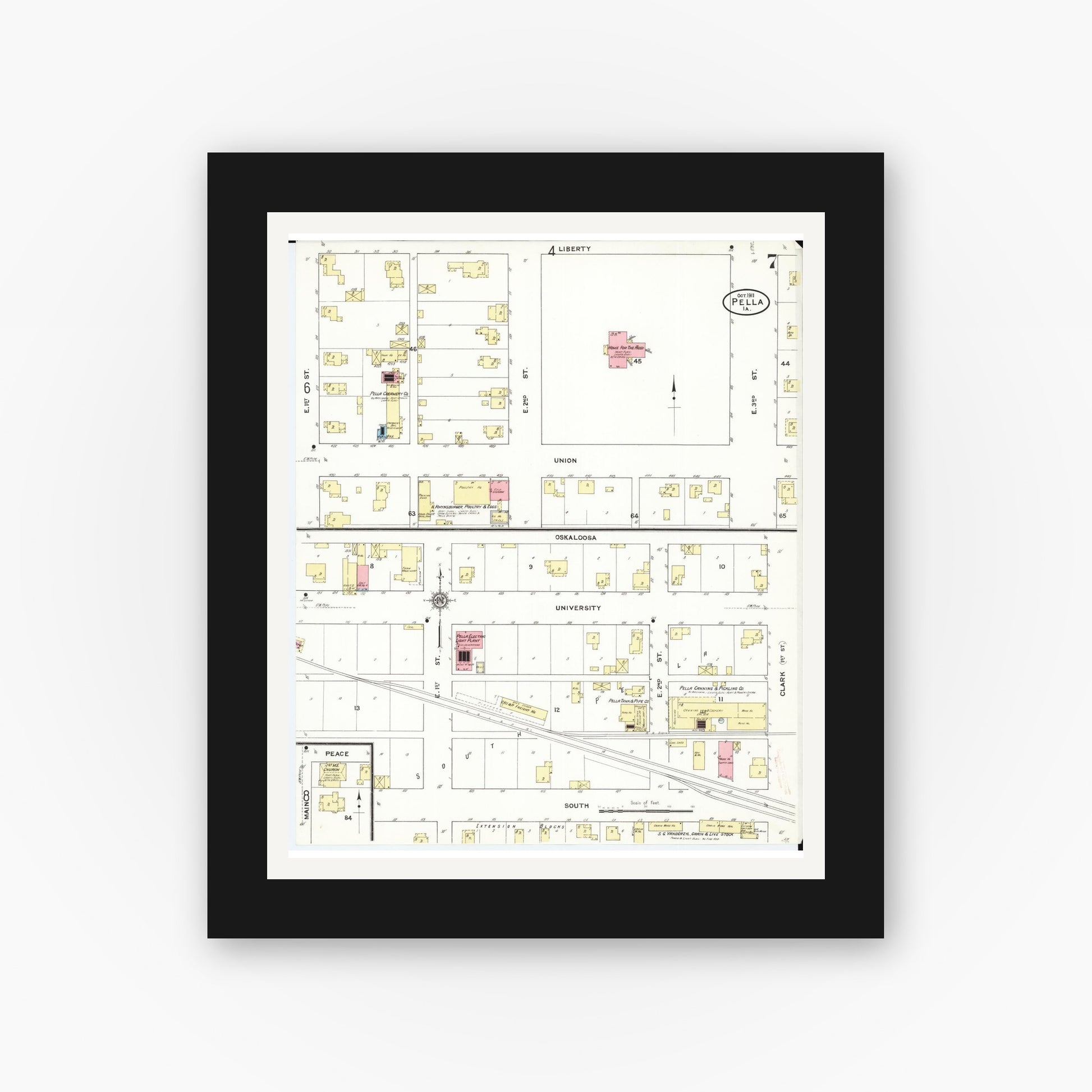 Old map wall art mockup — black gallery frame with white mat — Sanborn Fire Insurance Map from Pella, Marion County, Iowa (1911), Sheet #0007