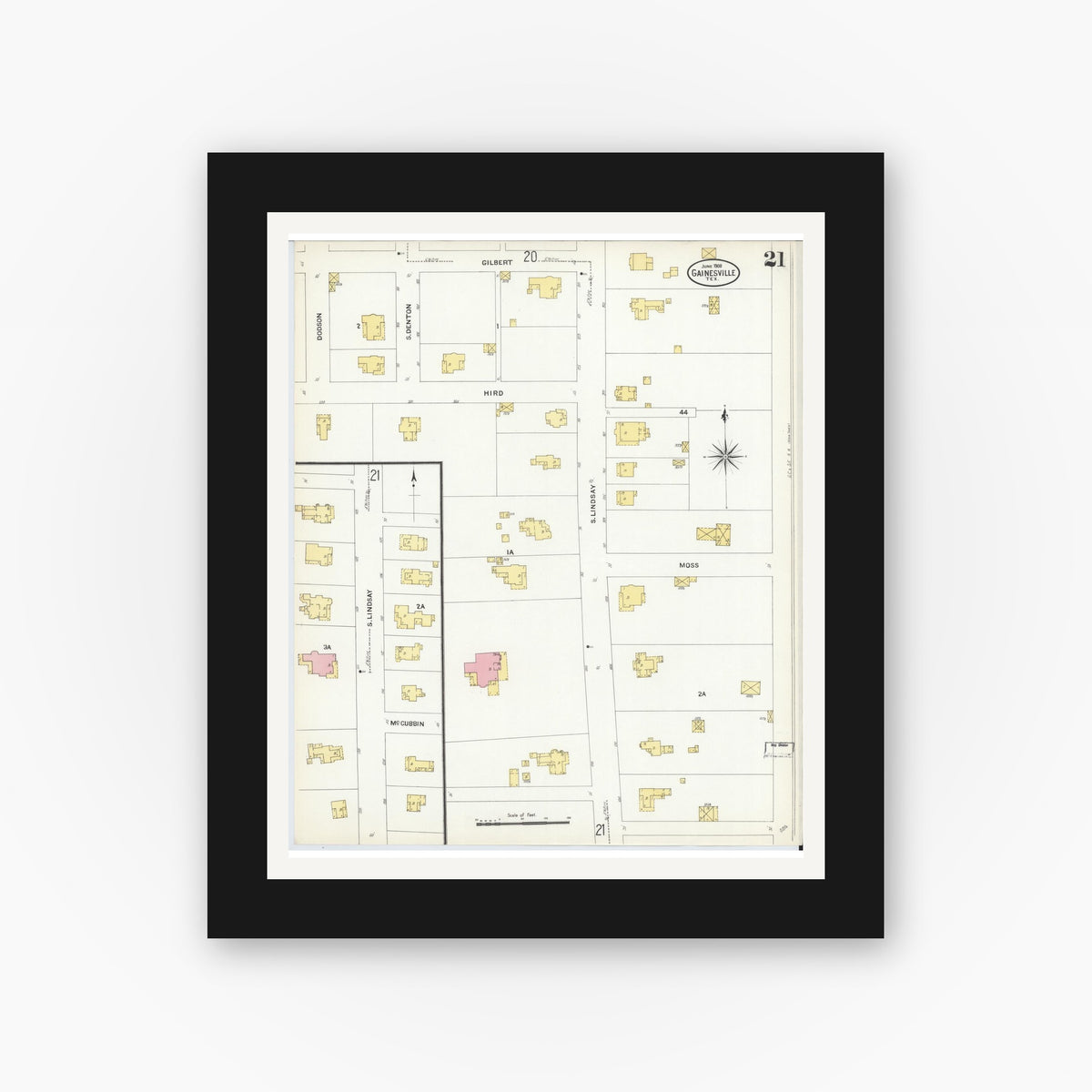 Old map wall art mockup — black gallery frame with white mat — Sanborn Fire Insurance Map from Gainesville, Cooke County, Texas (1908), Sheet #0021