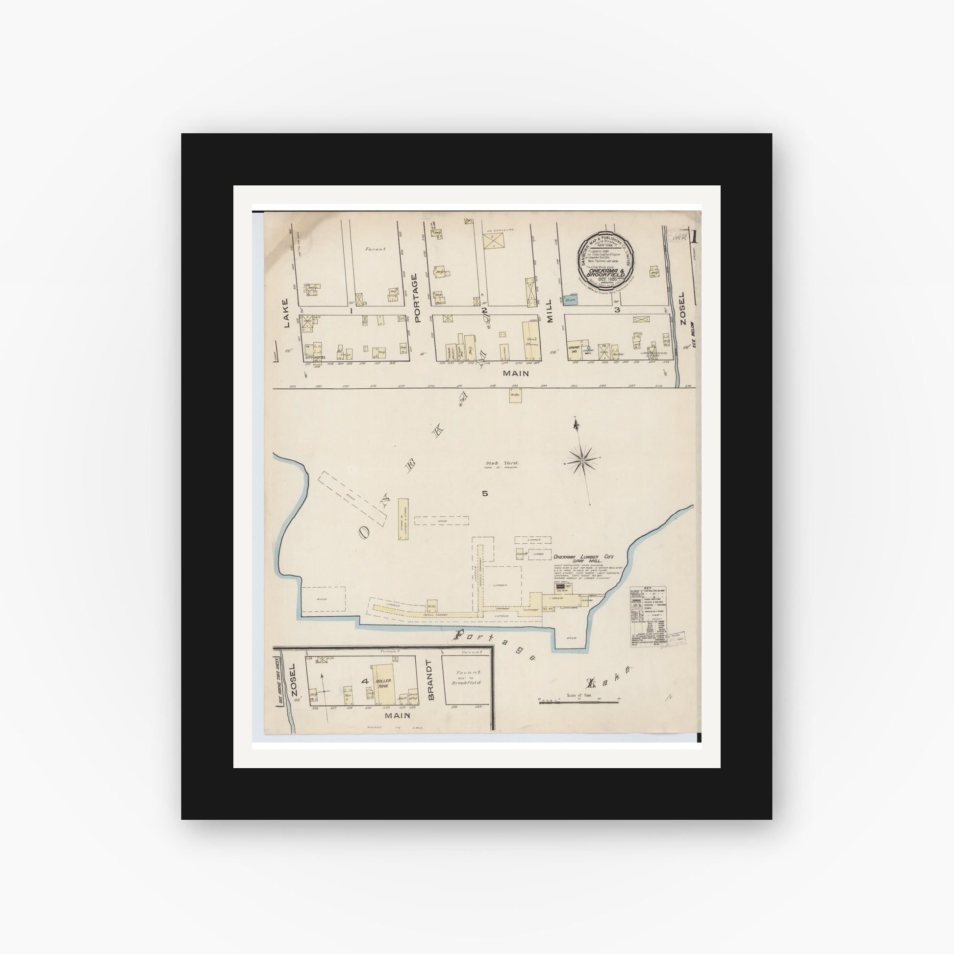 Old map wall art mockup — black gallery frame with white mat — Sanborn Fire Insurance Map from Onekama, Manistee County, Michigan (1885) - Complete Map Set