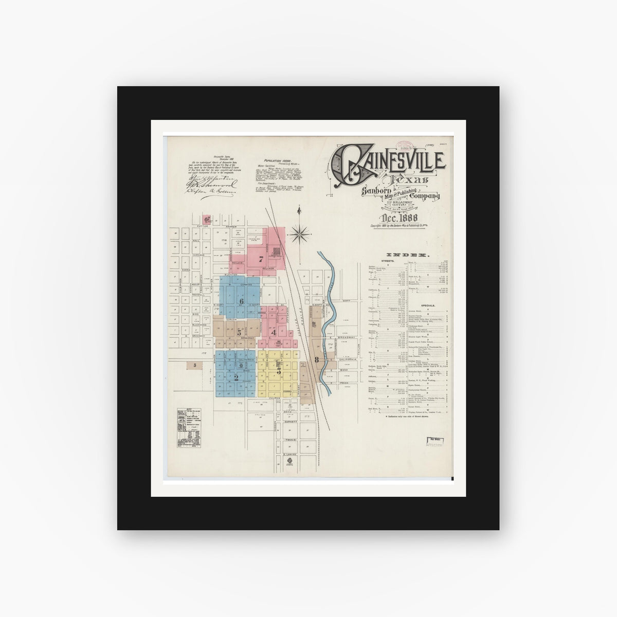 Old map wall art mockup — black gallery frame with white mat — Sanborn Fire Insurance Map from Gainesville, Cooke County, Texas (1888), Sheet #0001