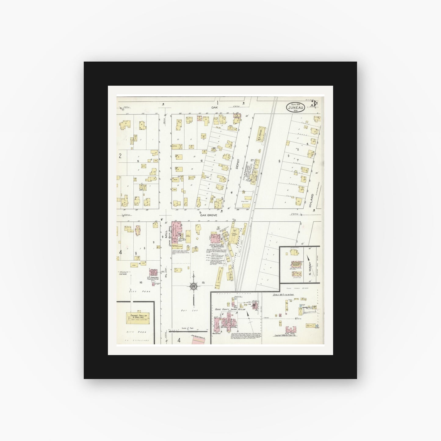 Old map wall art mockup — black gallery frame with white mat — Sanborn Fire Insurance Map from Juneau, Dodge County, Wisconsin (1914), Sheet #0003