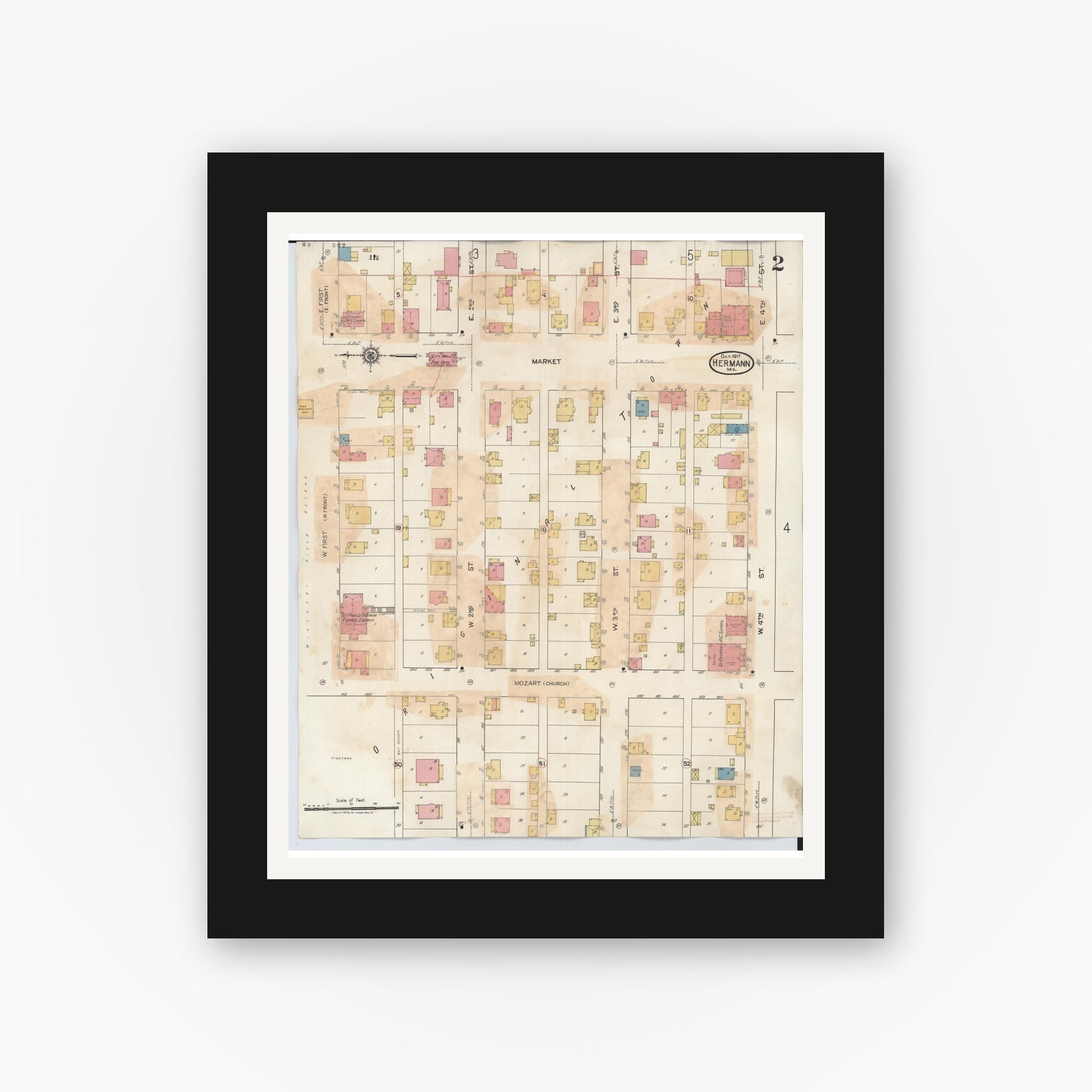 Old map wall art mockup — black gallery frame with white mat — Sanborn Fire Insurance Map from Hermann, Gasconade County, Missouri (1932), Sheet #0002