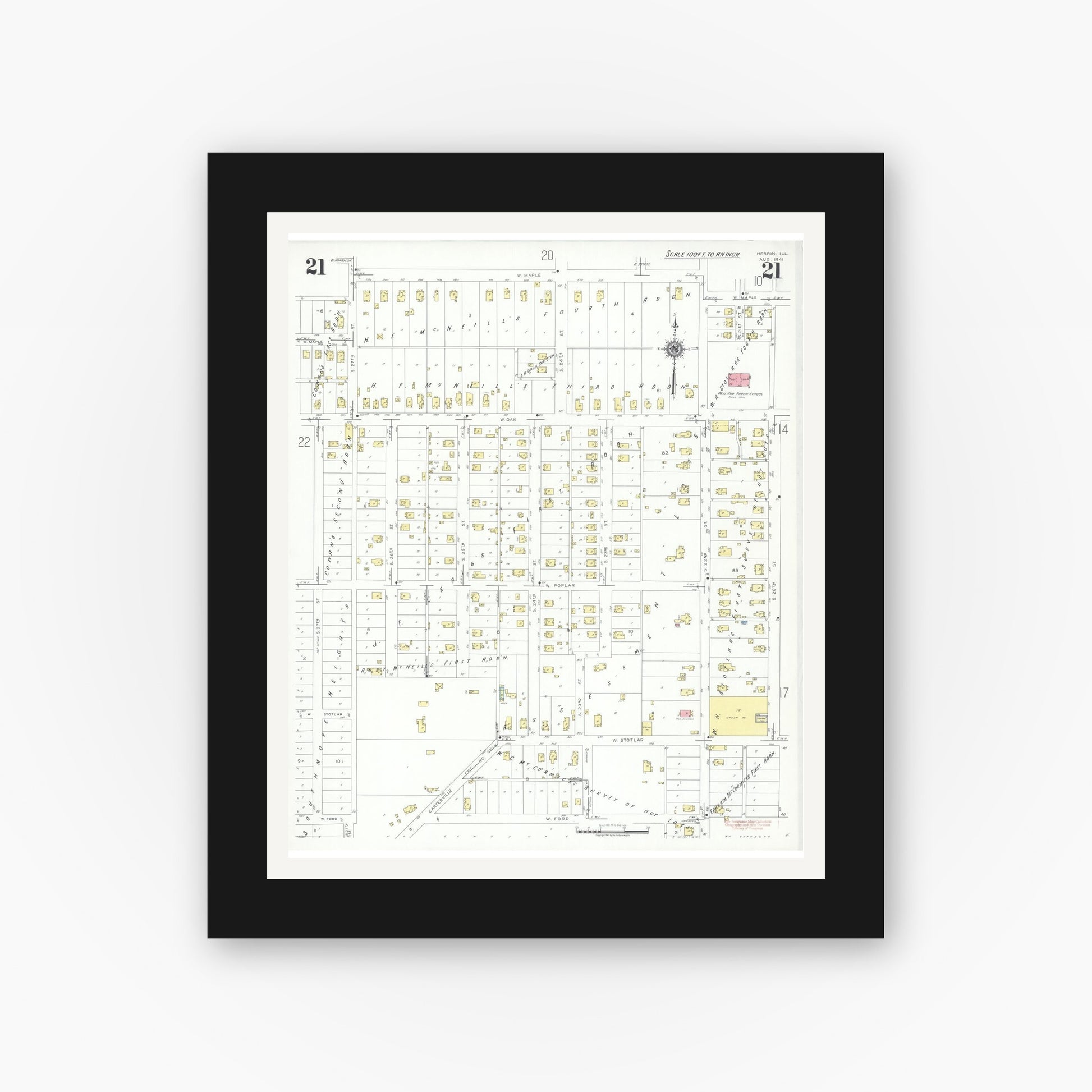 Old map wall art mockup — black gallery frame with white mat — Sanborn Fire Insurance Map from Herrin, Williamson County, Illinois (1941), Sheet #0021
