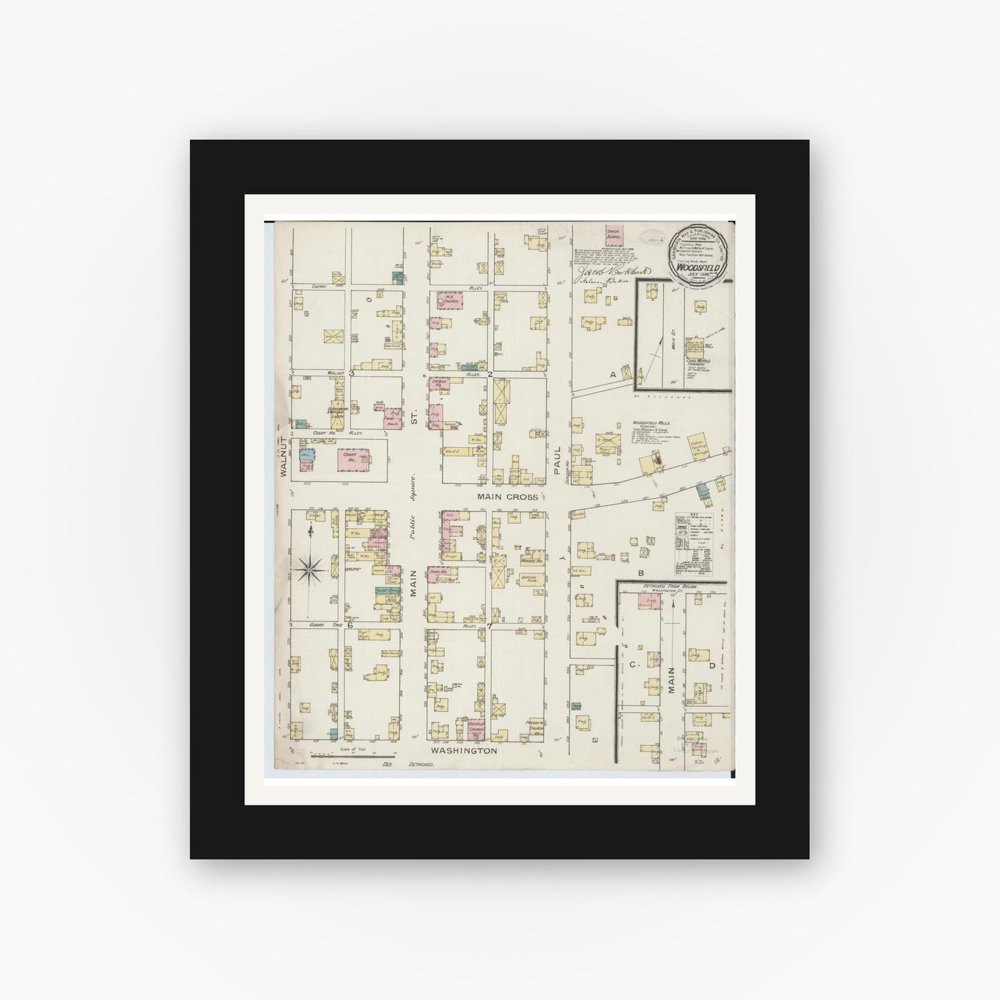 Old map wall art mockup — black gallery frame with white mat — Sanborn Fire Insurance Map from Woodsfield, Monroe County, Ohio (1886), Sheet #0001