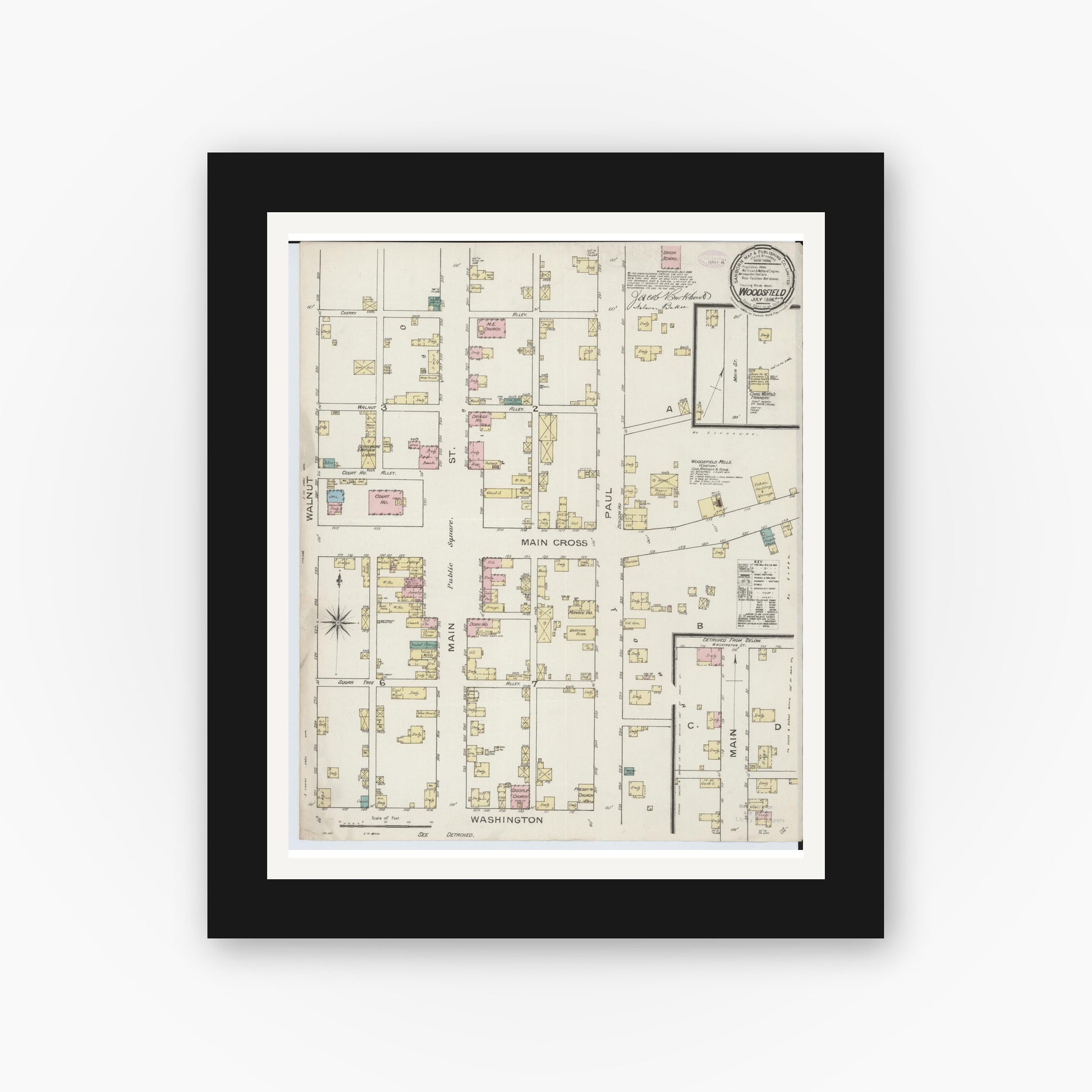 Old map wall art mockup — black gallery frame with white mat — Sanborn Fire Insurance Map from Woodsfield, Monroe County, Ohio (1886), Sheet #0001