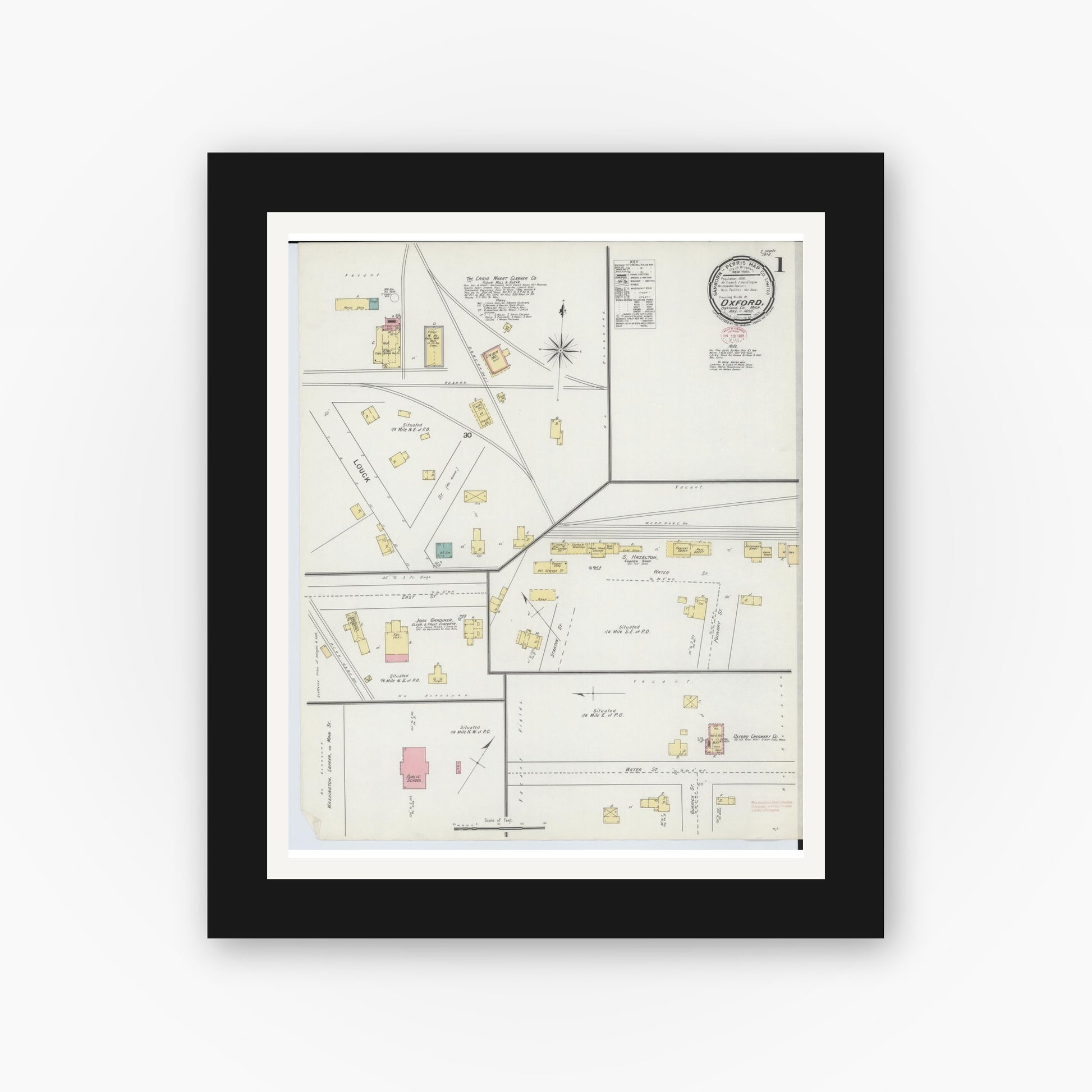 Old map wall art mockup — black gallery frame with white mat — Sanborn Fire Insurance Map from Oxford, Oakland County, Michigan (1895) - Complete Map Set
