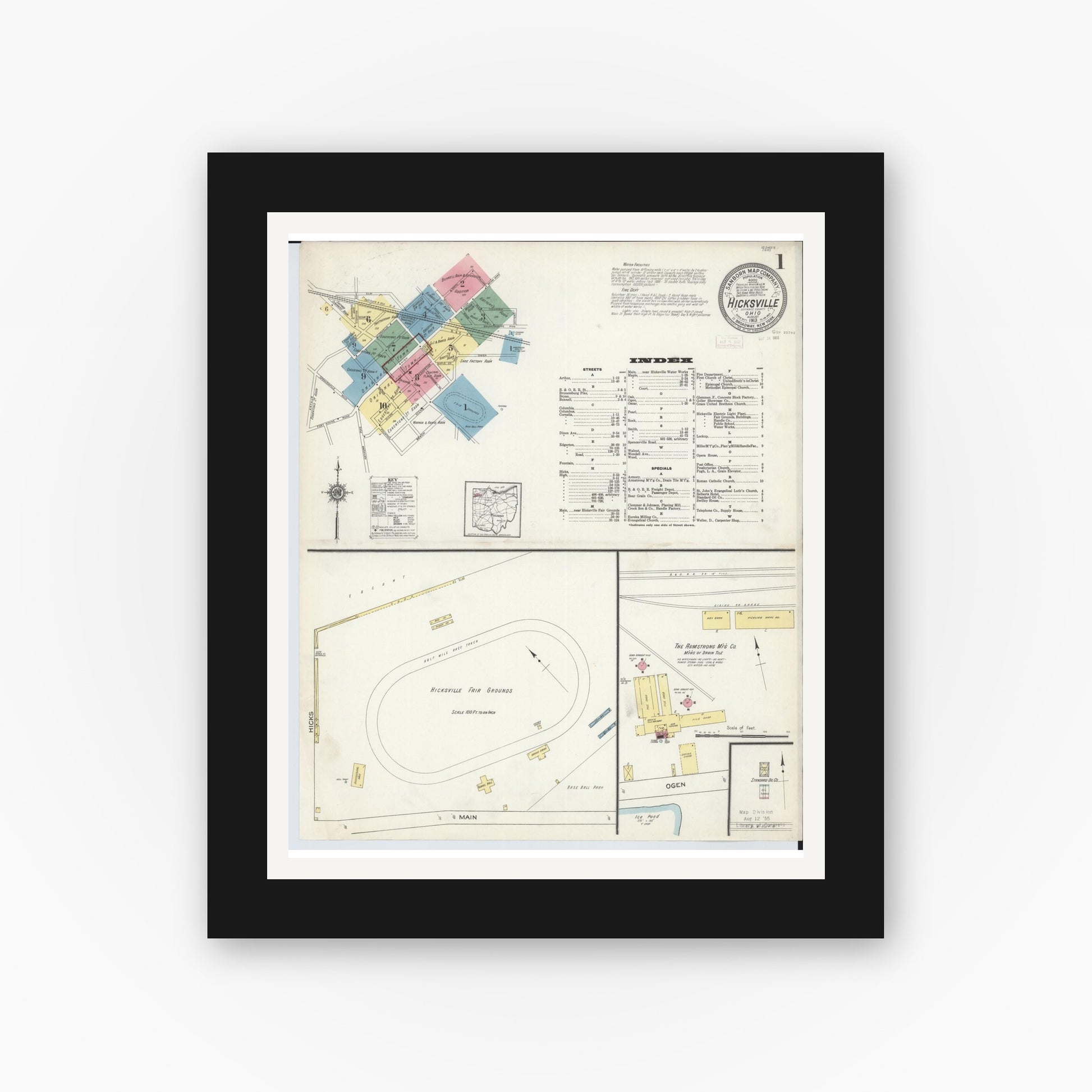 Old map wall art mockup — black gallery frame with white mat — Sanborn Fire Insurance Map from Hicksville, Defiance County, Ohio (1913), Sheet #0001
