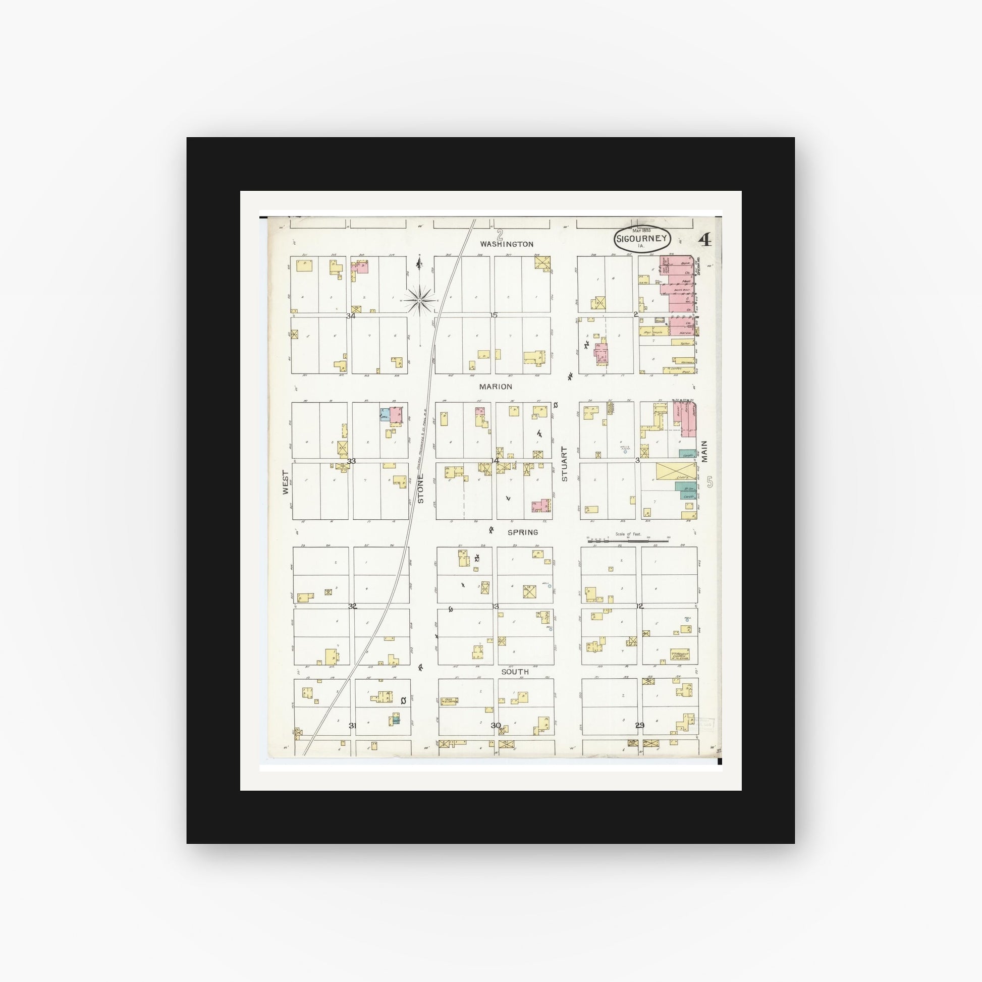 Old map wall art mockup — black gallery frame with white mat — Sanborn Fire Insurance Map from Sigourney, Kiokuk County, Iowa (1893), Sheet #0004