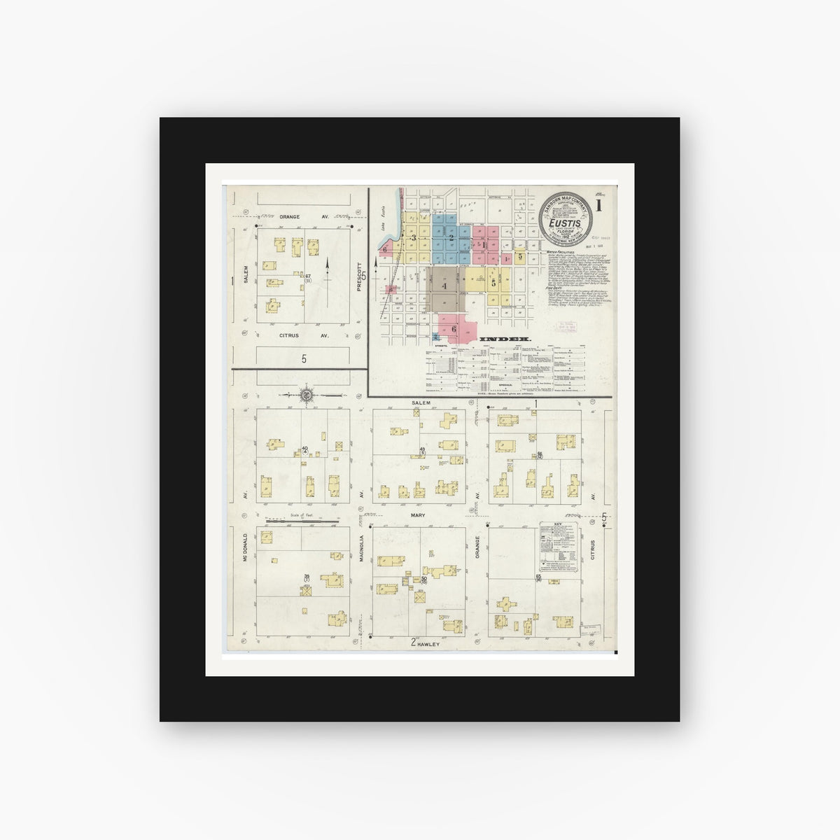 Old map wall art mockup — black gallery frame with white mat — Sanborn Fire Insurance Map from Eustis, Lake County, Florida (1912), Sheet #0001