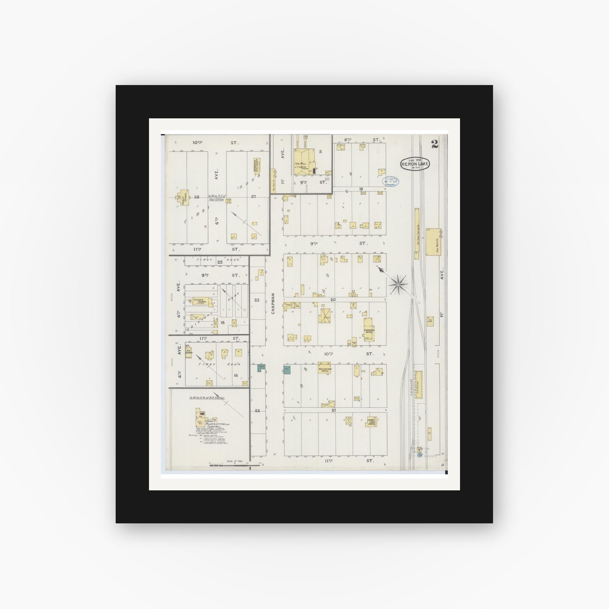 Old map wall art mockup — black gallery frame with white mat — Sanborn Fire Insurance Map from Heron Lake, Jackson County, Minnesota (1894), Sheet #0002