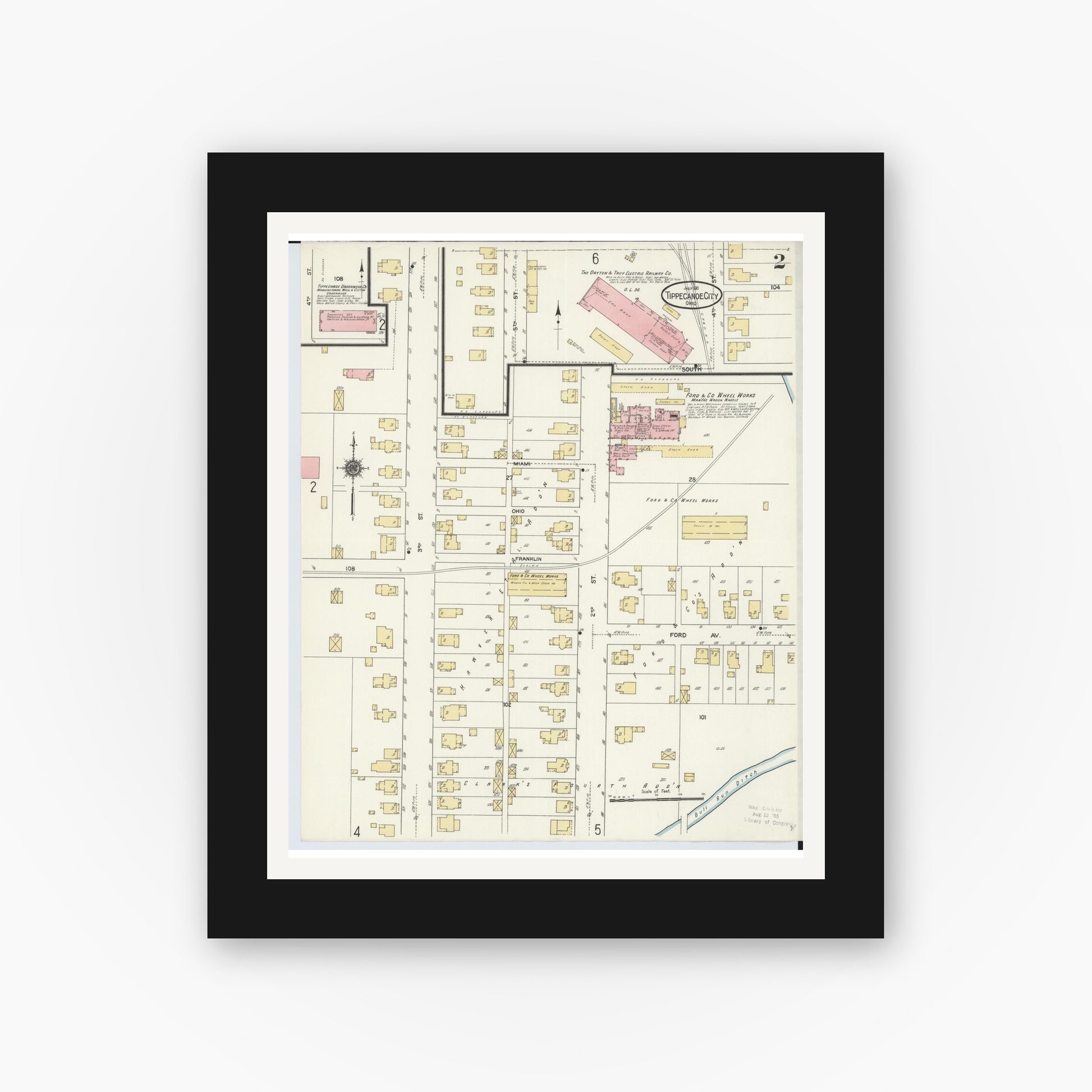 Old map wall art mockup — black gallery frame with white mat — Sanborn Fire Insurance Map from Tipp City, Miami County, Ohio (1911), Sheet #0002