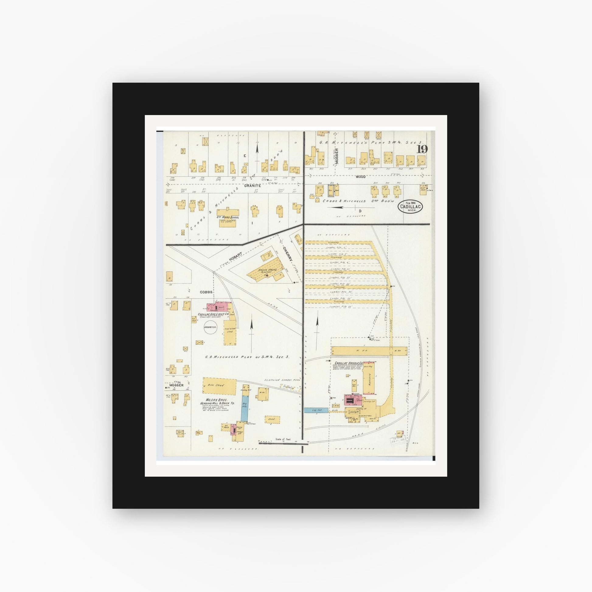 Old map wall art mockup — black gallery frame with white mat — Sanborn Fire Insurance Map from Cadillac, Wexford County, Michigan (1906), Sheet #0019