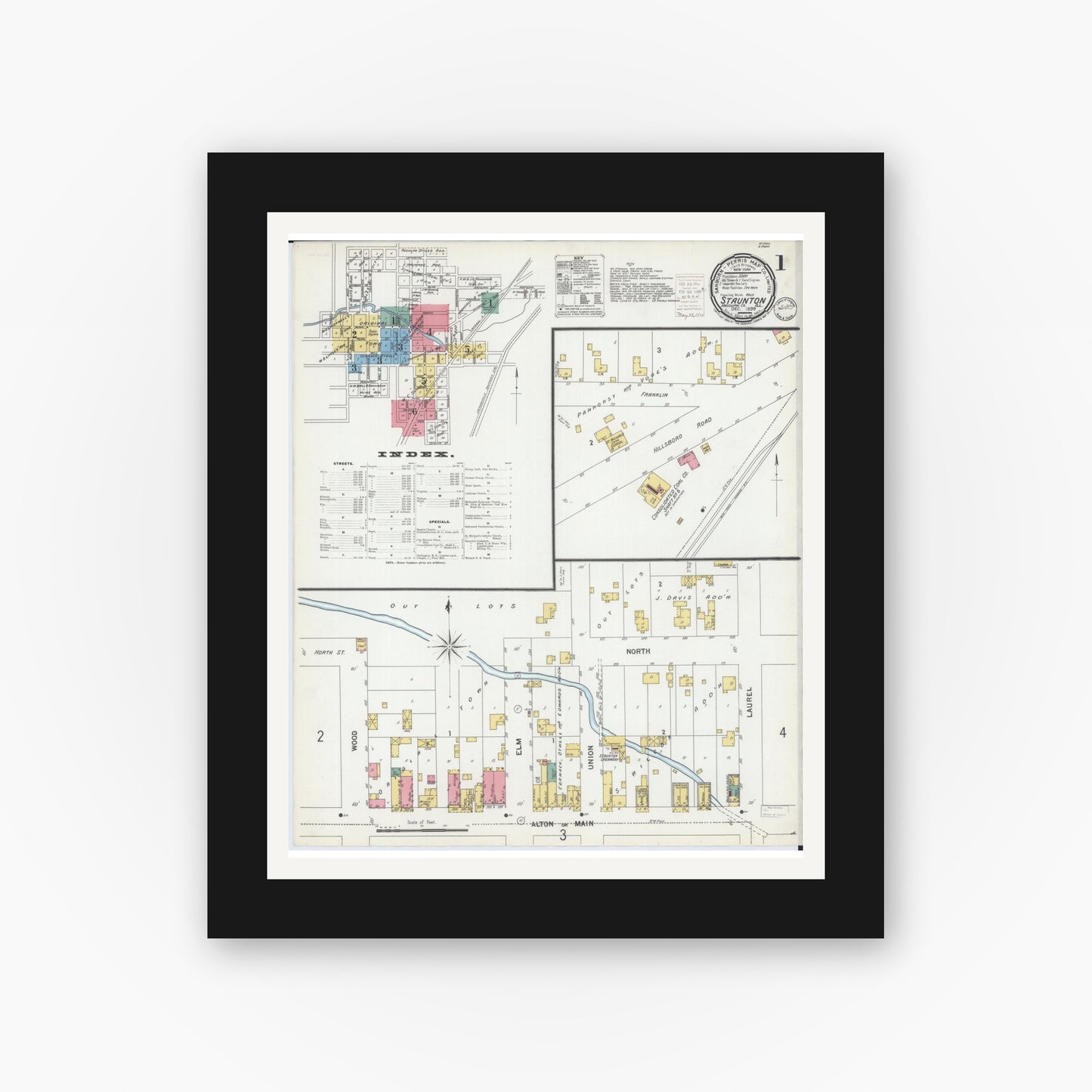 Old map wall art mockup — black gallery frame with white mat — Sanborn Fire Insurance Map from Staunton, Macoupin County, Illinois (1899), Sheet #0001