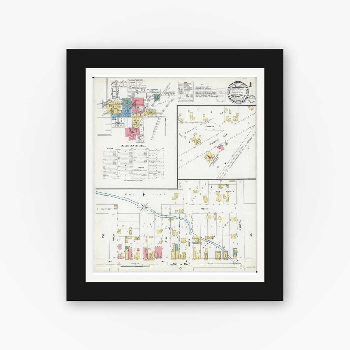 Old map wall art mockup — black gallery frame with white mat — Sanborn Fire Insurance Map from Staunton, Macoupin County, Illinois (1899), Sheet #0001
