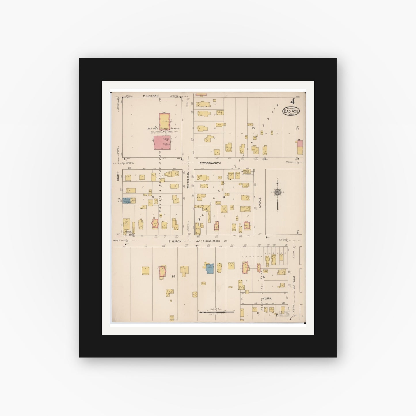 Old map wall art mockup — black gallery frame with white mat — Sanborn Fire Insurance Map from Bad Axe, Huron County, Michigan (1922), Sheet #0004