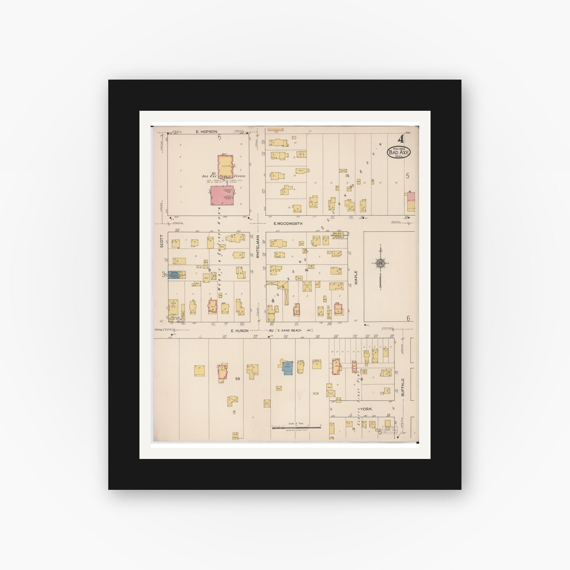 Old map wall art mockup — black gallery frame with white mat — Sanborn Fire Insurance Map from Bad Axe, Huron County, Michigan (1922), Sheet #0004