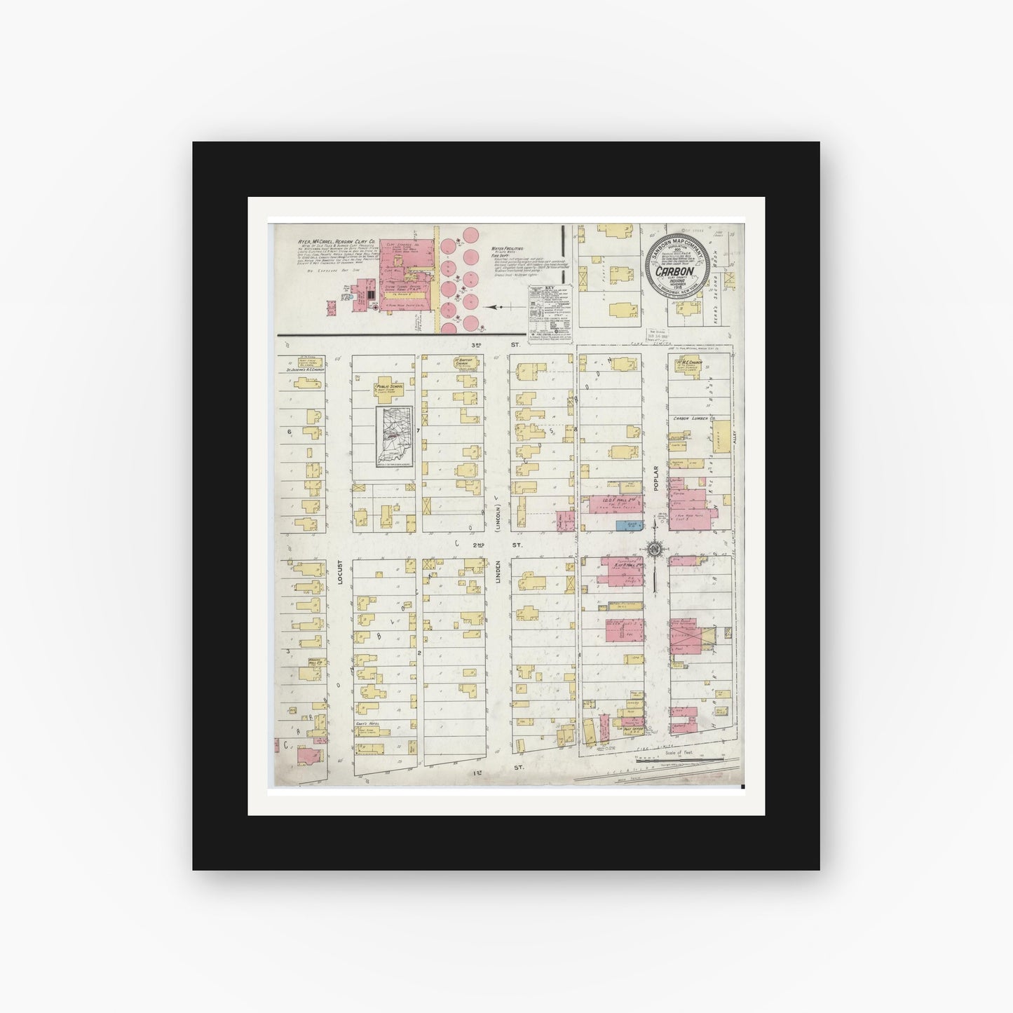 Old map wall art mockup — black gallery frame with white mat — Sanborn Fire Insurance Map from Carbon, Clay County, Indiana (1918), Sheet #0001