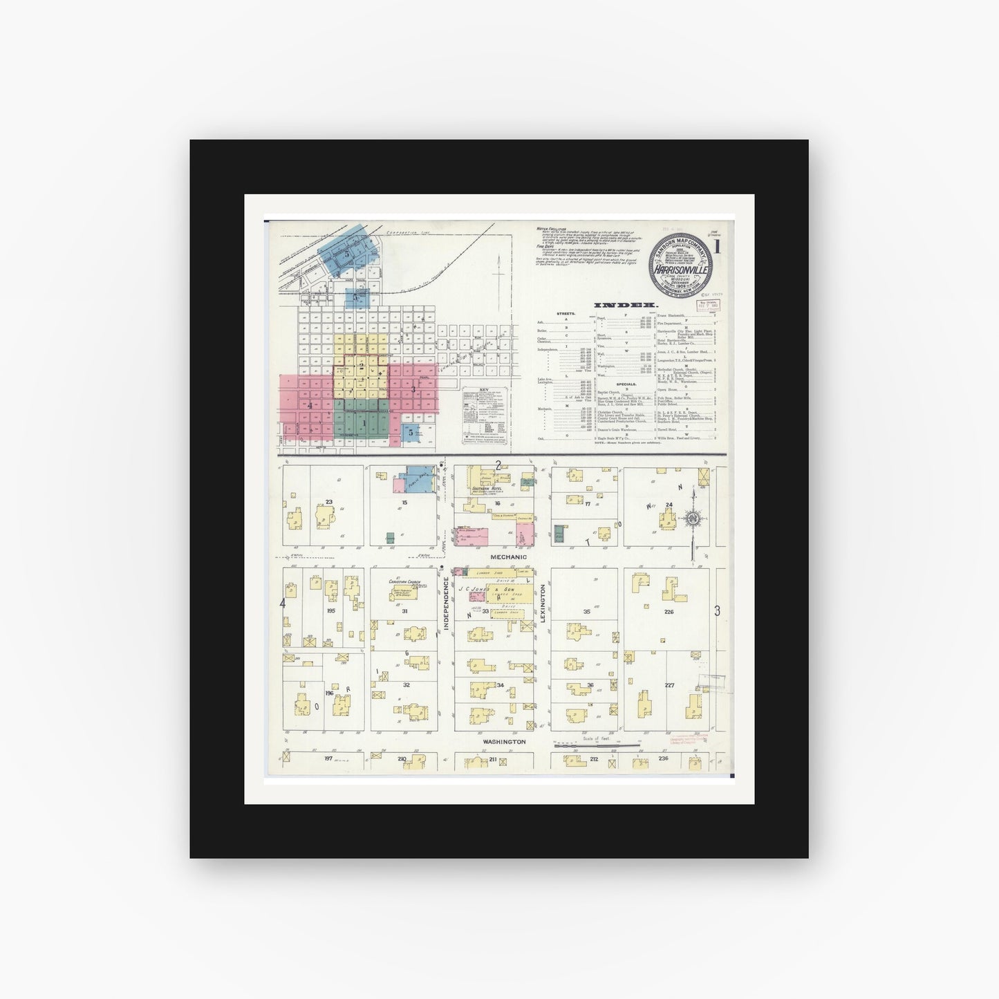 Old map wall art mockup — black gallery frame with white mat — Sanborn Fire Insurance Map from Harrisonville, Cass County, Missouri (1909) - Complete Map Set