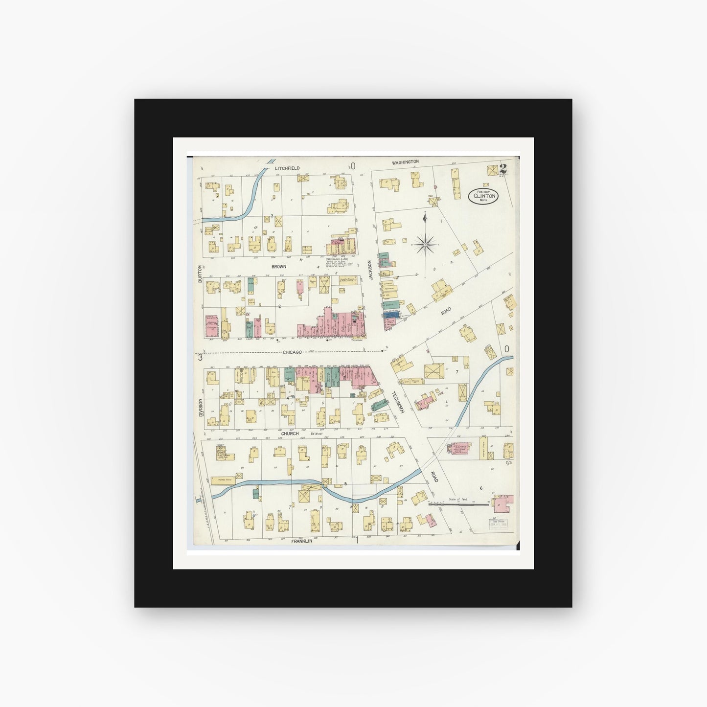 Old map wall art mockup — black gallery frame with white mat — Sanborn Fire Insurance Map from Clinton, Lenawee County, Michigan (1907), Sheet #0002