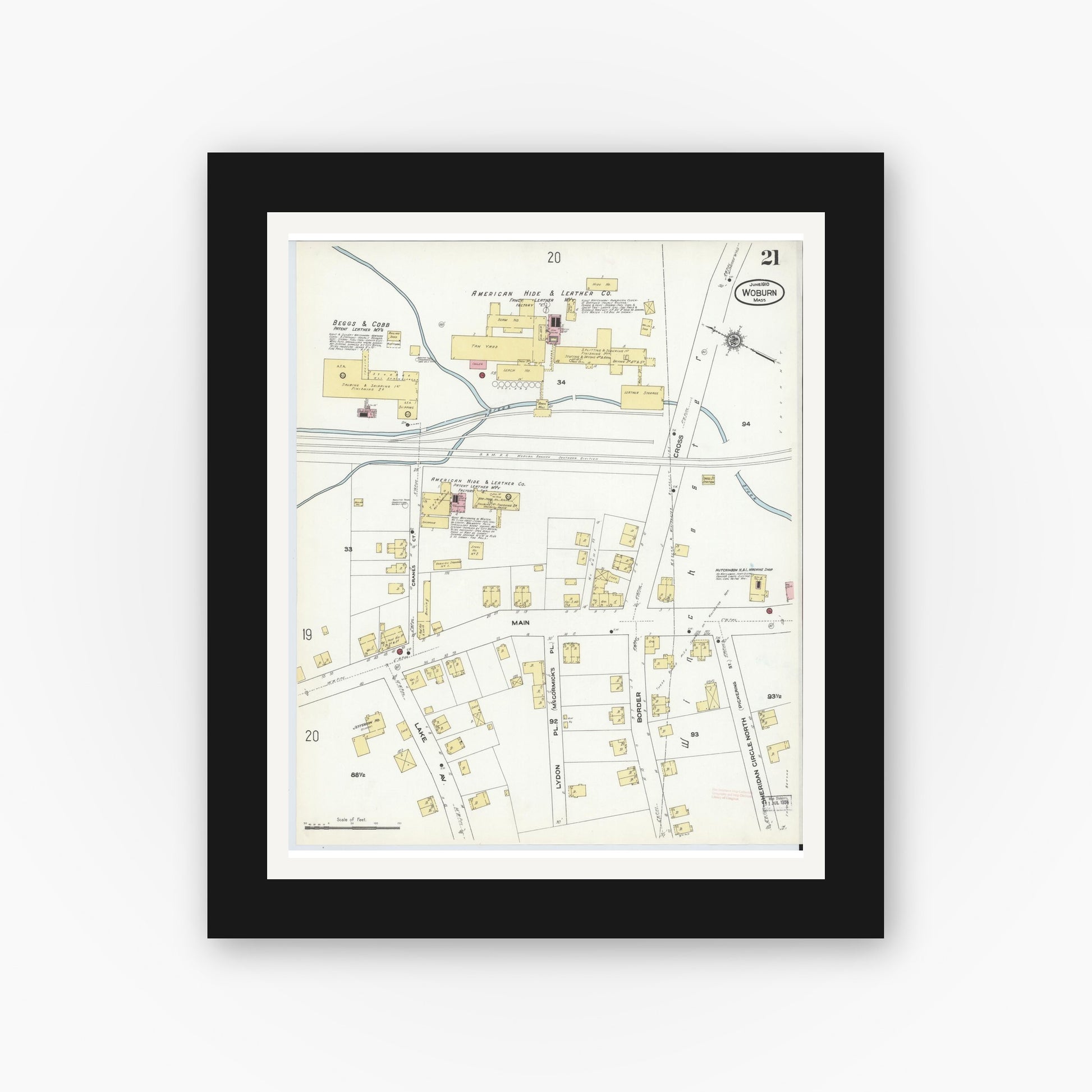 Old map wall art mockup — black gallery frame with white mat — Sanborn Fire Insurance Map from Woburn, Middlesex County, Massachusetts (1910), Sheet #0021