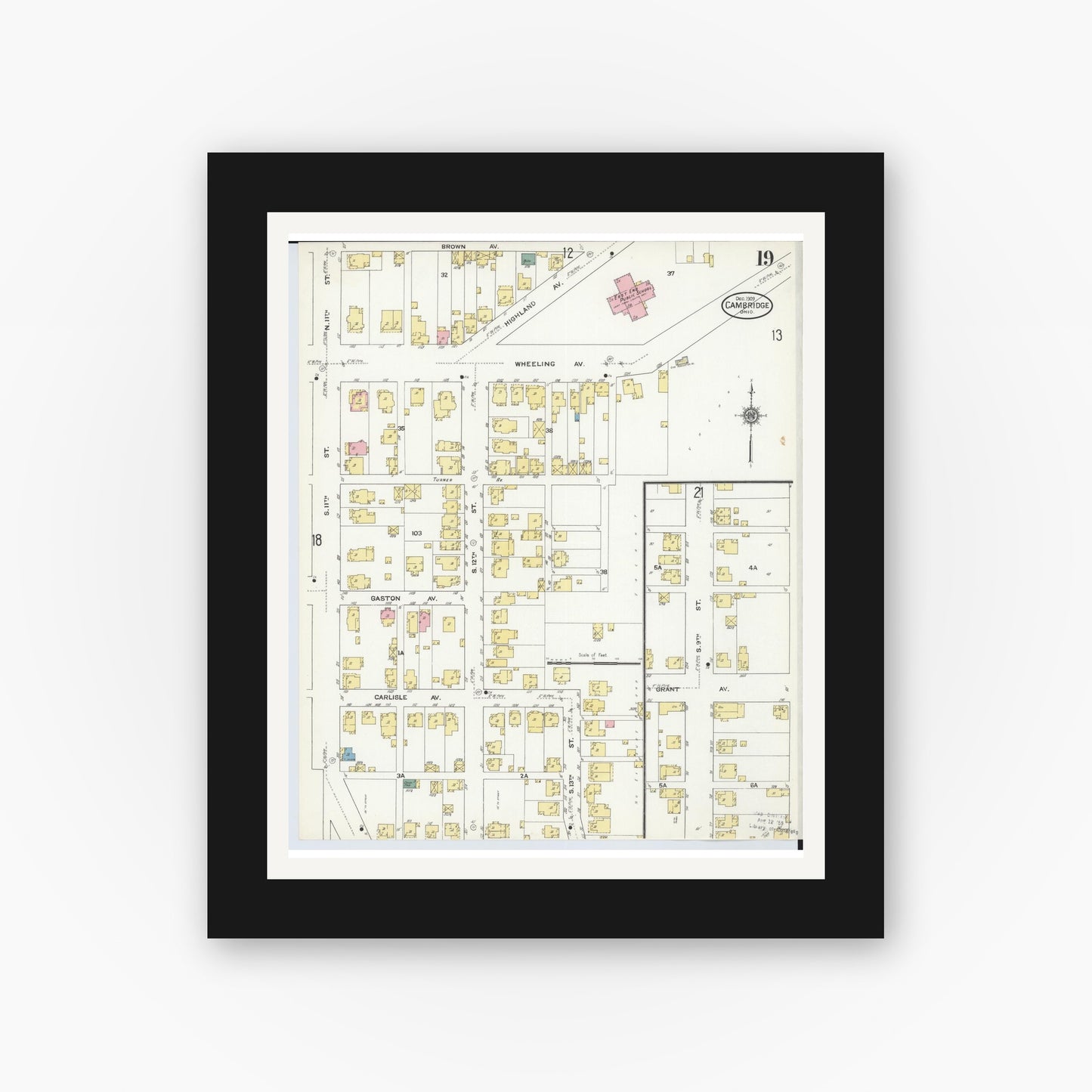 Old map wall art mockup — black gallery frame with white mat — Sanborn Fire Insurance Map from Cambridge, Guernsey County, Ohio (1909), Sheet #0019
