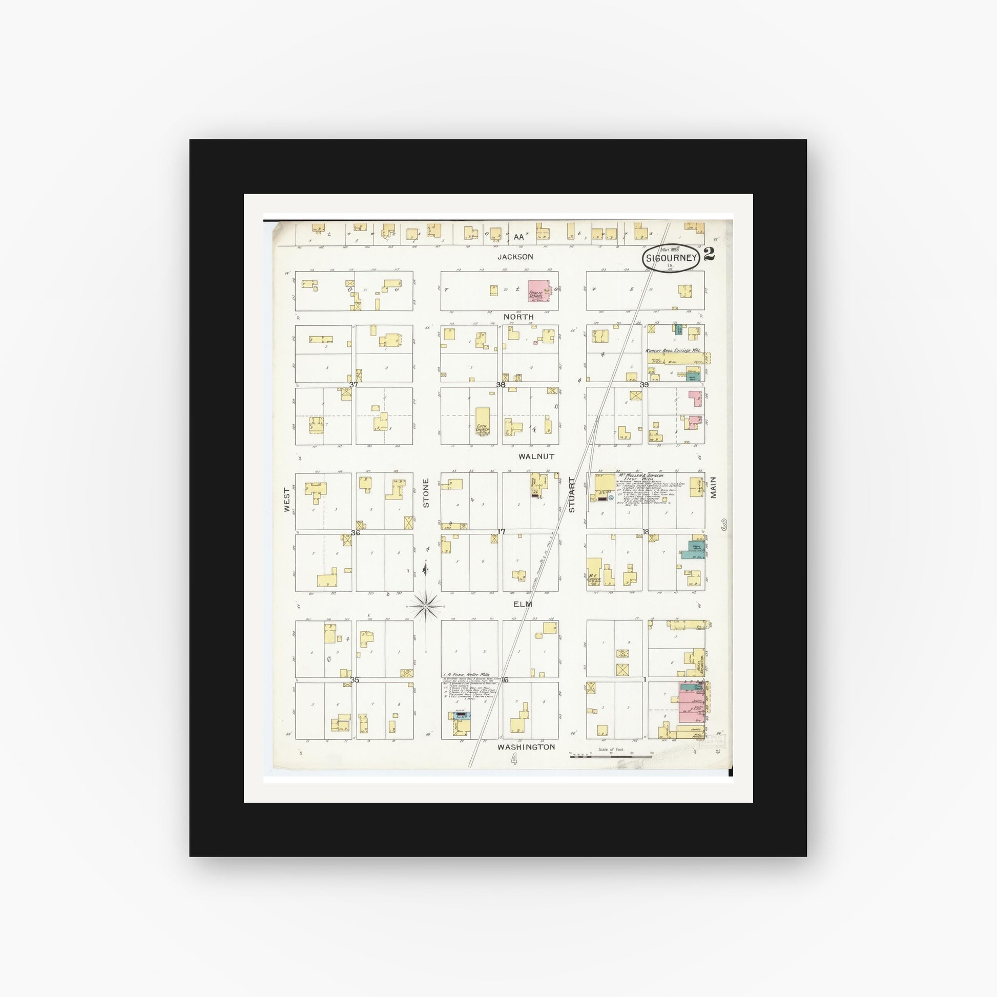 Old map wall art mockup — black gallery frame with white mat — Sanborn Fire Insurance Map from Sigourney, Kiokuk County, Iowa (1893), Sheet #0002