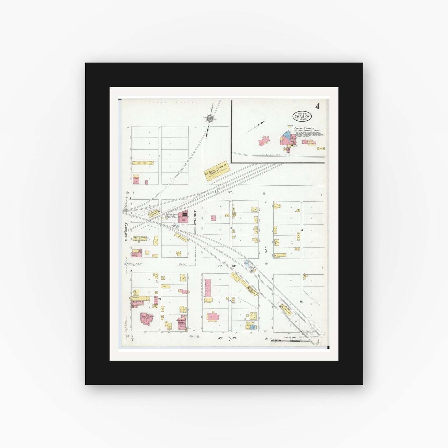 Old map wall art mockup — black gallery frame with white mat — Sanborn Fire Insurance Map from Chaska, Carver County, Minnesota (1910), Sheet #0004