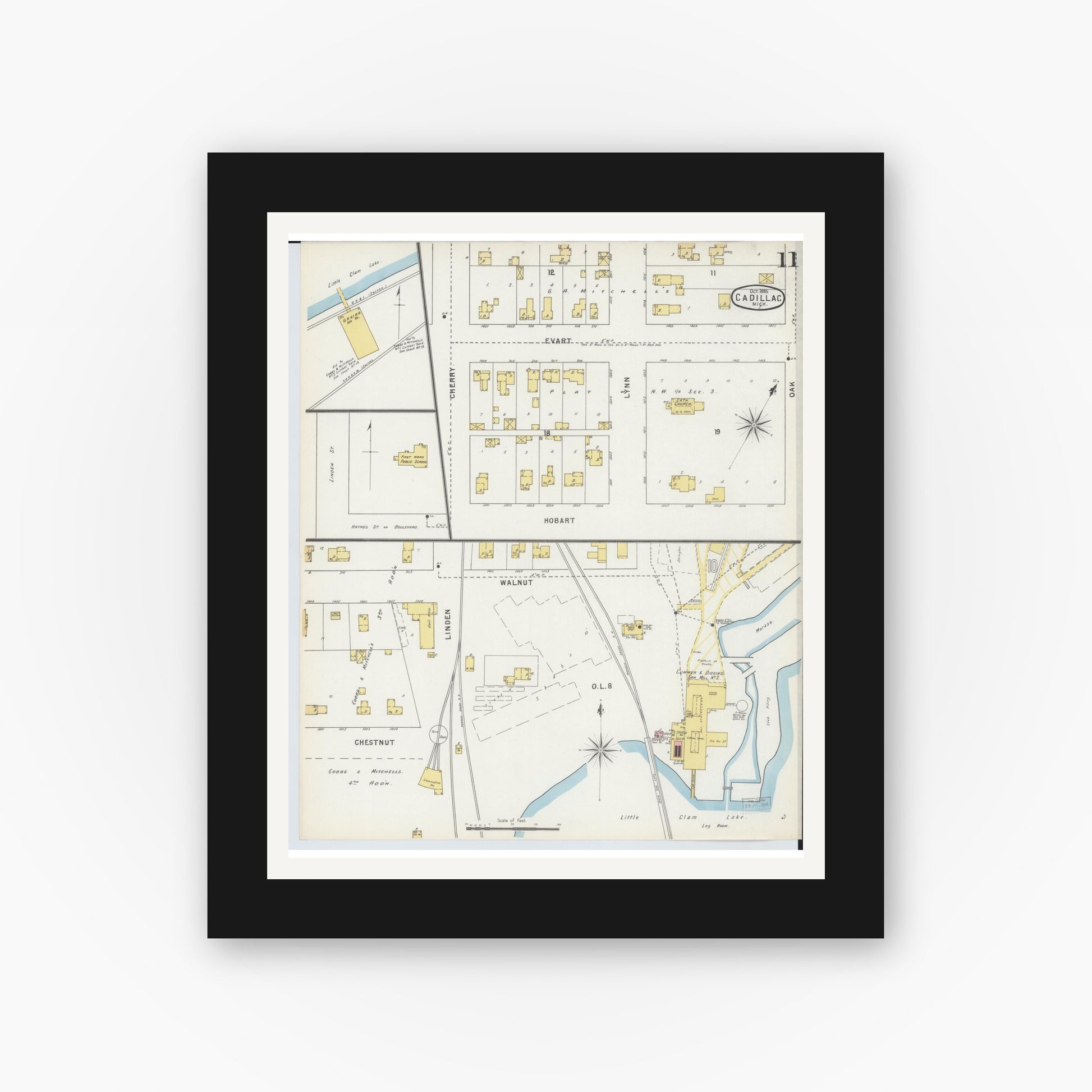 Old map wall art mockup — black gallery frame with white mat — Sanborn Fire Insurance Map from Cadillac, Wexford County, Michigan (1895), Sheet #0011