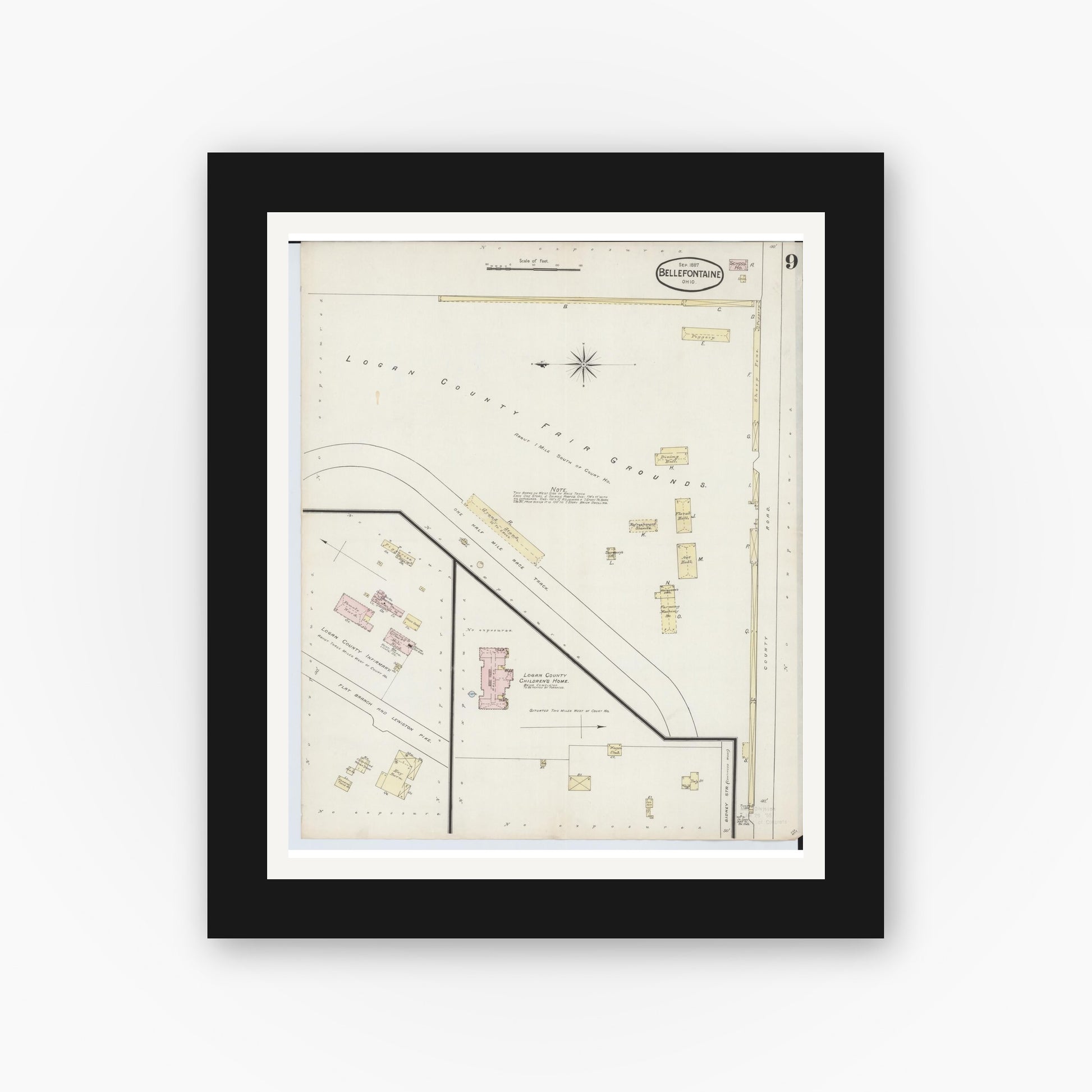 Old map wall art mockup — black gallery frame with white mat — Sanborn Fire Insurance Map from Bellefontaine, Logan County, Ohio (1887), Sheet #0009