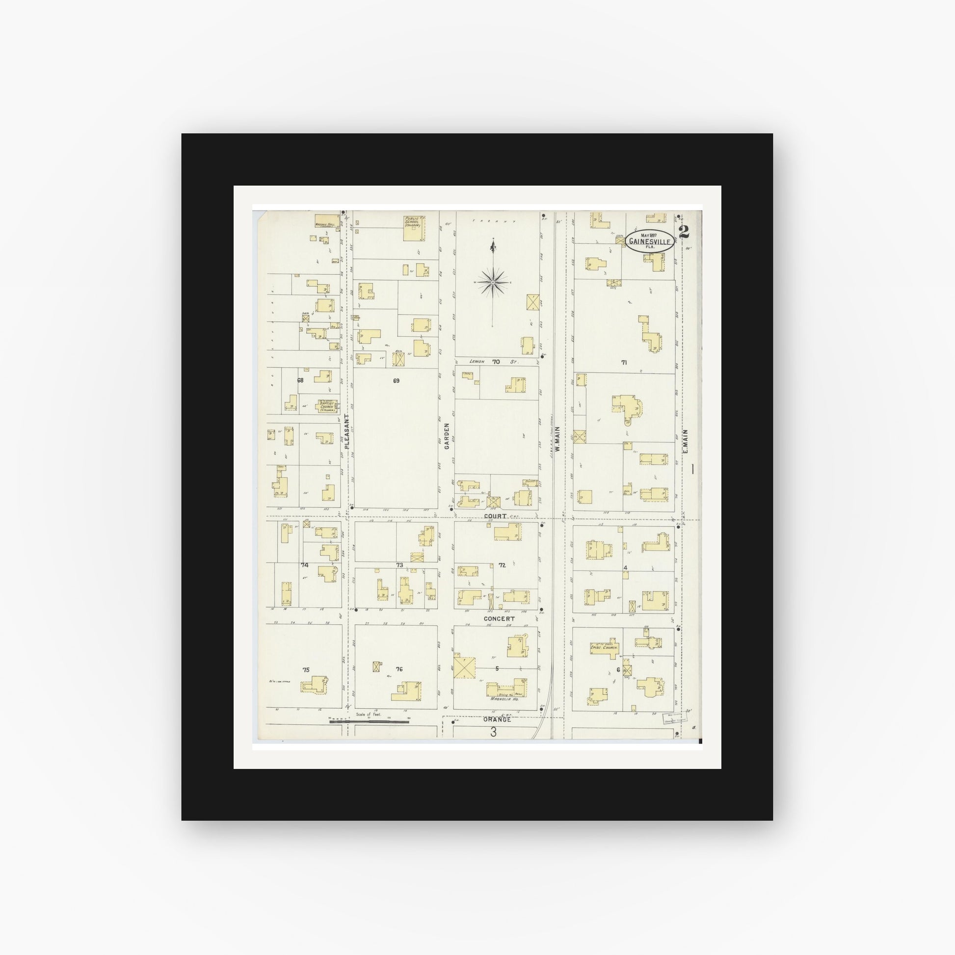 Old map wall art mockup — black gallery frame with white mat — Sanborn Fire Insurance Map from Gainesville, Alachua County, Florida (1897), Sheet #0002