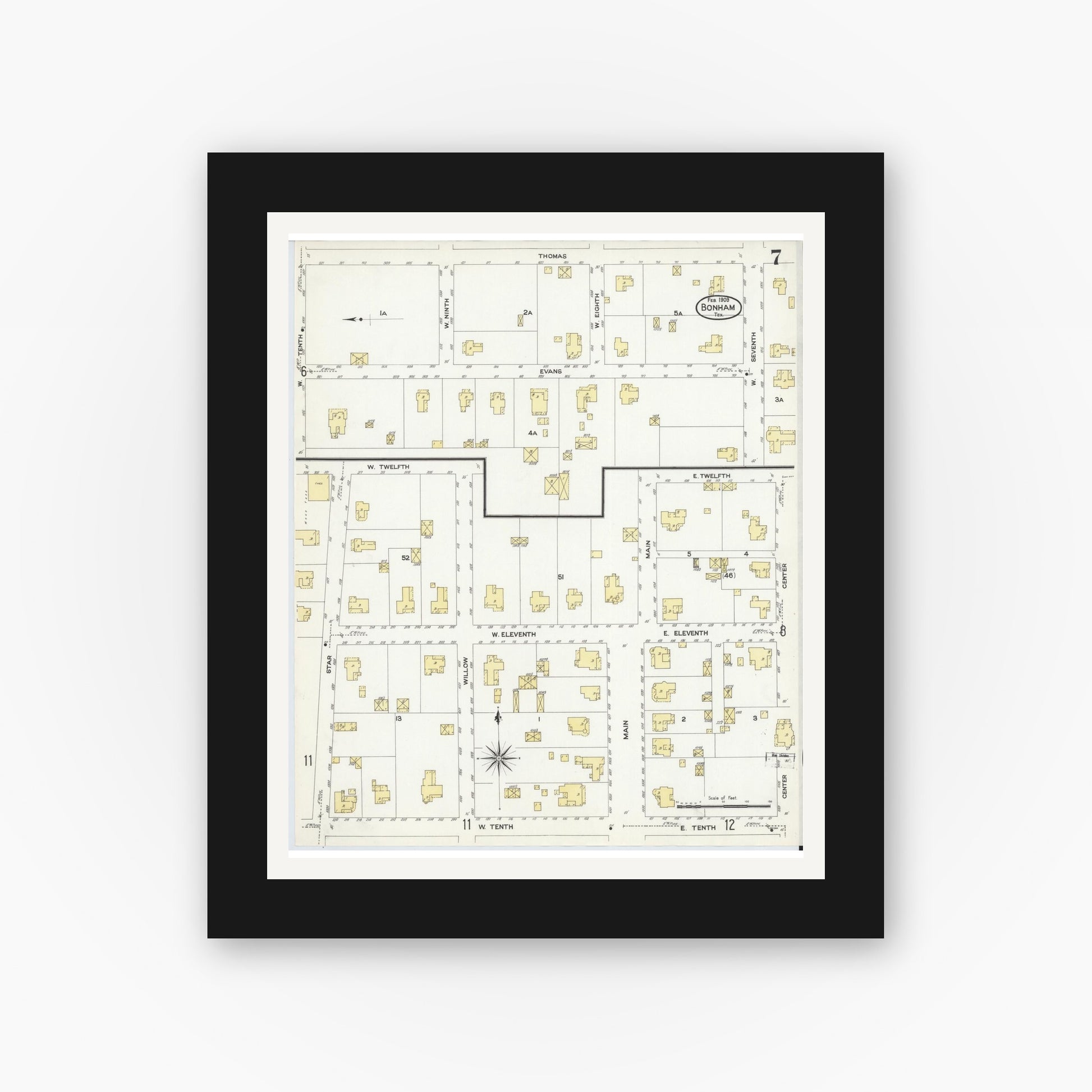 Old map wall art mockup — black gallery frame with white mat — Sanborn Fire Insurance Map from Bonham, Fannin County, Texas (1909), Sheet #0007