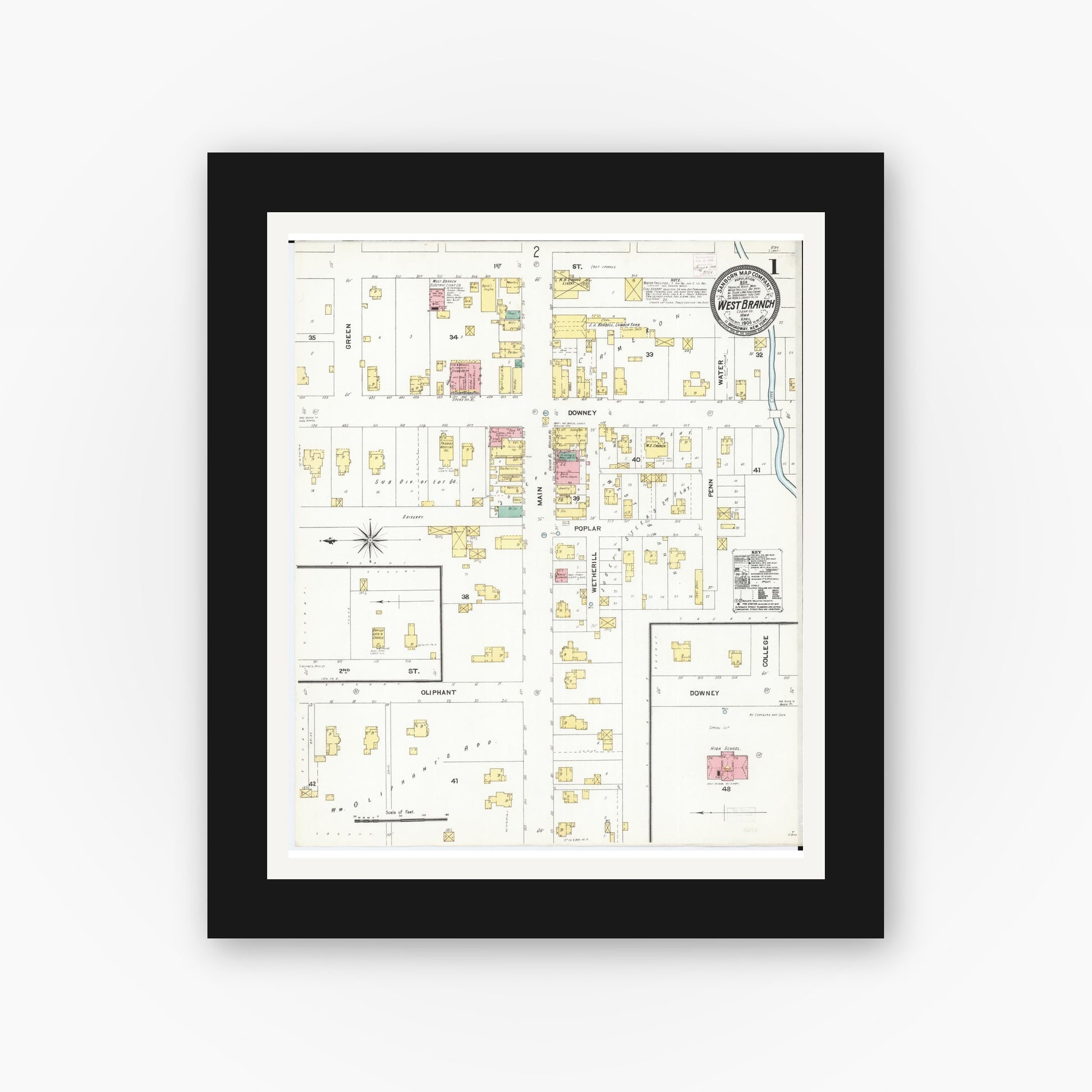 Old map wall art mockup — black gallery frame with white mat — Sanborn Fire Insurance Map from West Branch, Cedar County, Iowa (1906), Sheet #0001