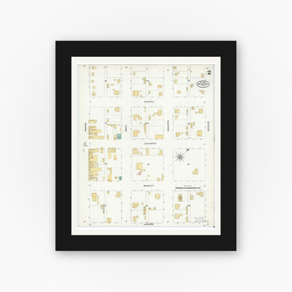 Old map wall art mockup — black gallery frame with white mat — Sanborn Fire Insurance Map from Manor, Travis County, Texas (1905), Sheet #0002