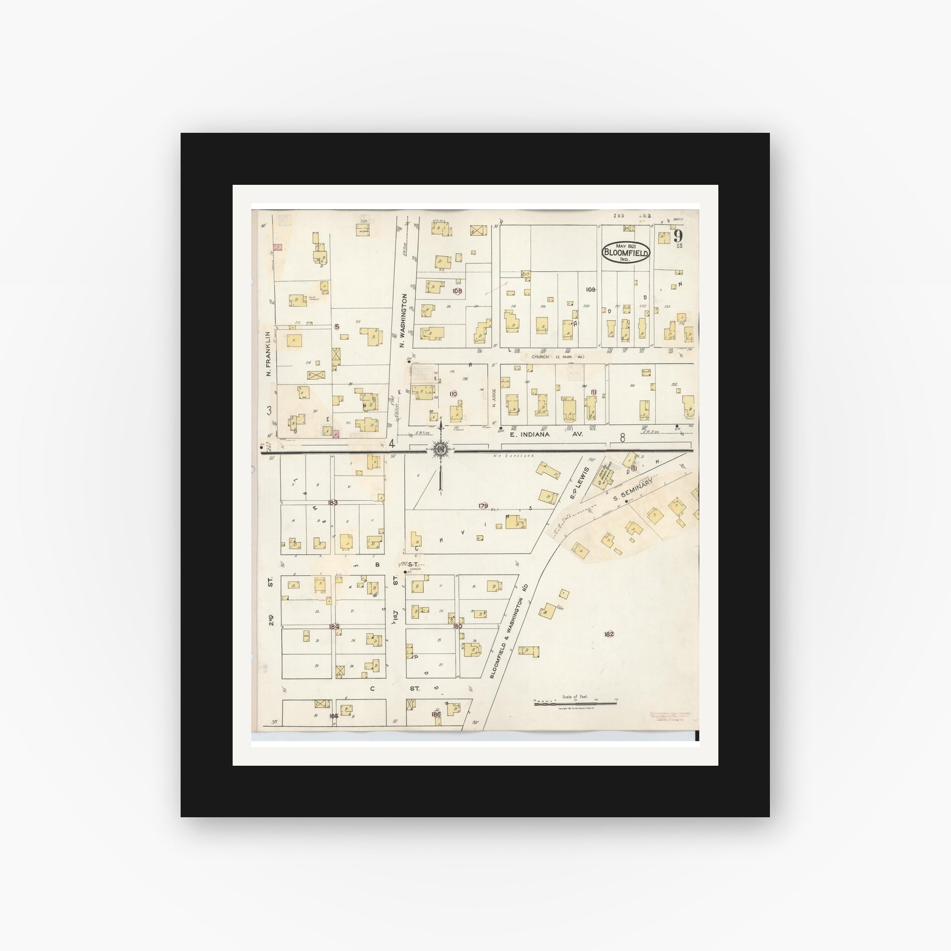 Old map wall art mockup — black gallery frame with white mat — Sanborn Fire Insurance Map from Bloomfield, Greene County, Indiana (1940), Sheet #0009
