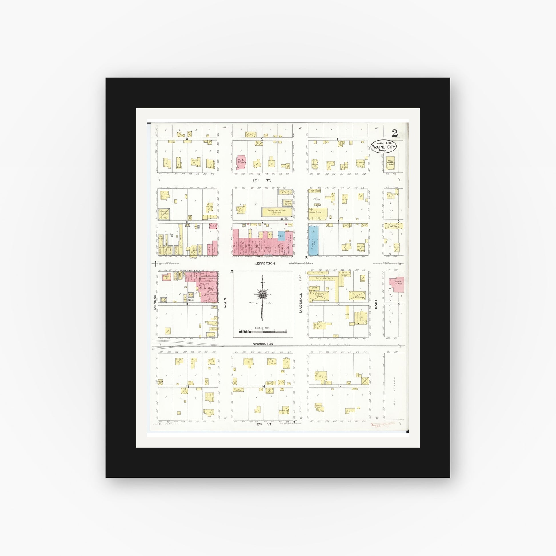 Old map wall art mockup — black gallery frame with white mat — Sanborn Fire Insurance Map from Prairie City, Jasper County, Iowa (1916), Sheet #0002