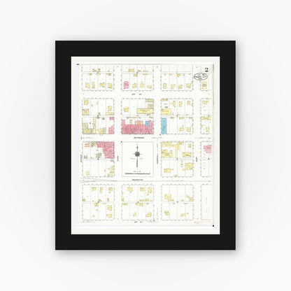 Old map wall art mockup — black gallery frame with white mat — Sanborn Fire Insurance Map from Prairie City, Jasper County, Iowa (1916), Sheet #0002